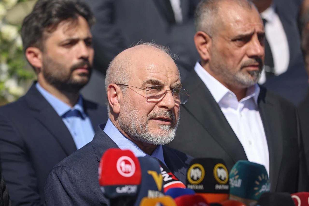 Iran's Parliament Speaker Mohammad Bagher Ghalibaf (C) speaks during a press conference at the site where Qassem Soleimani, commander of the "Quds Force" of Iran's Islamic Revolutionary Guards Corps (IRGC), was killed by a US airstrike in 2020, near the airport, upon his arrival in Baghdad, August 19, 2026. (AFP Photo)