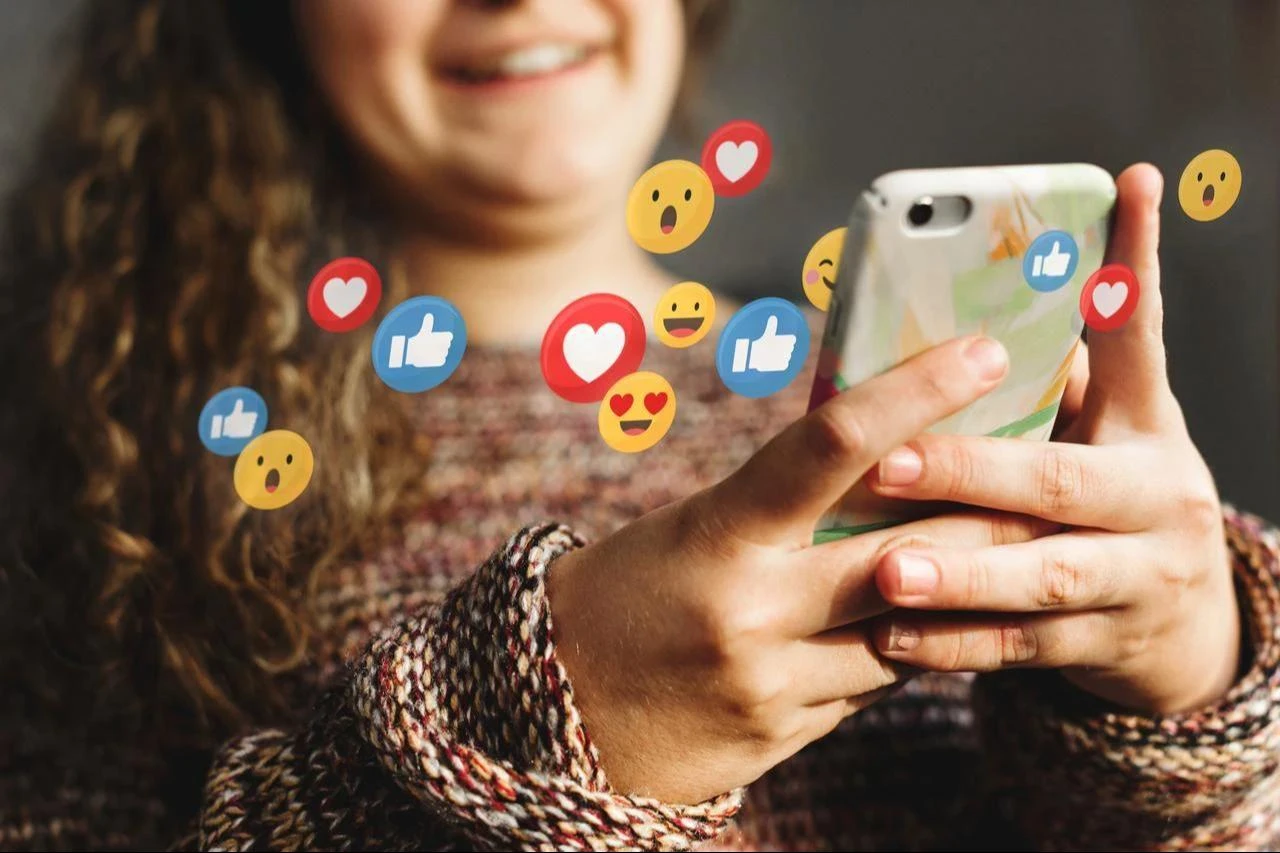 A child using social media. (Adobe Stock Photo)
