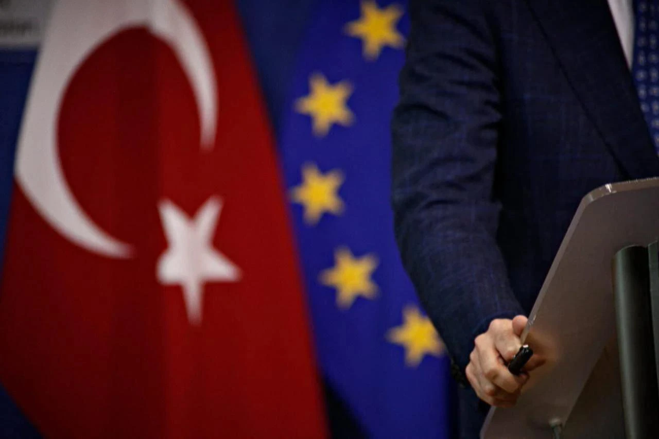 A man stands next to flags of the European Union and Türkiye at the headquarters of the European Commission in Brussels, Belgium, July 25, 2017. (AFP Photo)
