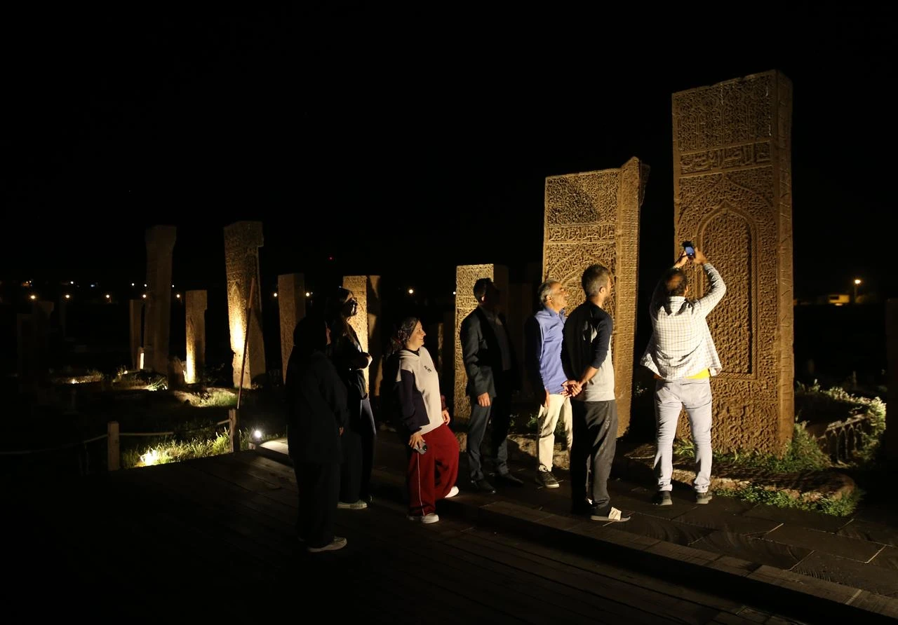 Visitors discover the Seljuk Meydan Cemetery in the Ahlat district of Bitlis during the "Night Museum" initiative. (AA Photo)