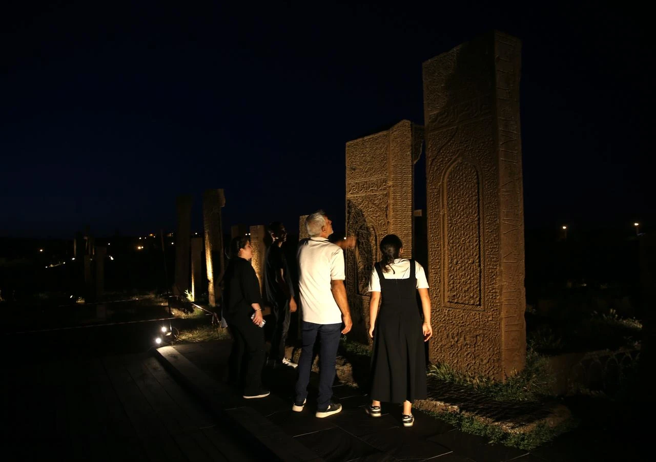 Visitors discover the Seljuk Meydan Cemetery in the Ahlat district of Bitlis during the "Night Museum" initiative. (AA Photo)
