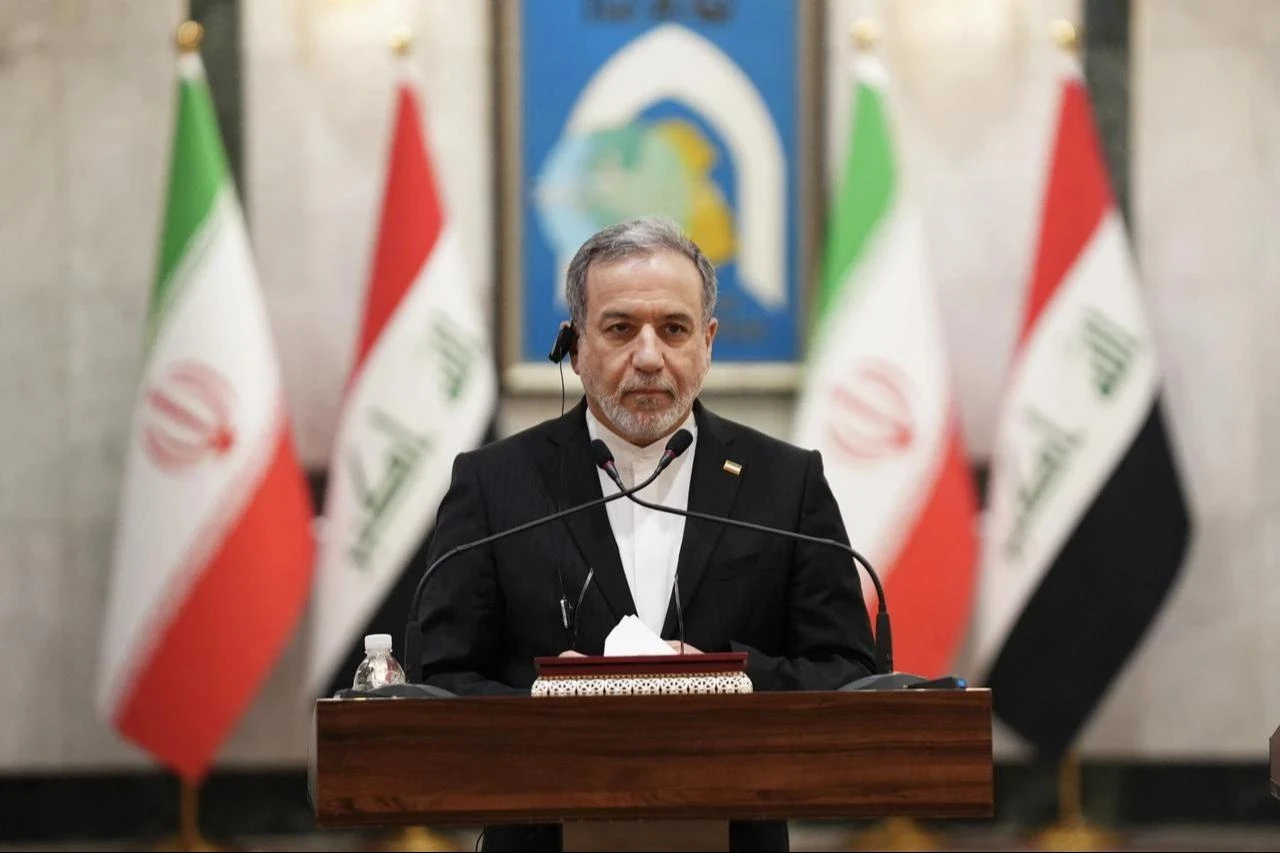 Iranian Foreign Minister Abbas Araghchi and his Iraqi counterpart Fuad Hussein (not seen) hold a joint press conference after their meeting at the headquarters of the Ministry of Foreign Affairs in Baghdad, Iraq, June 28, 2026. (AA Photo)