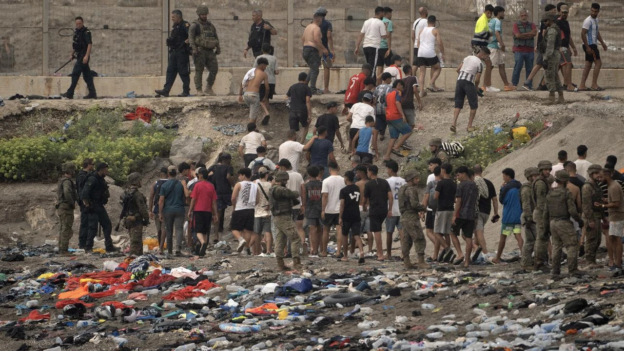 Mass migrant influx overwhelms Spain's Ceuta enclave