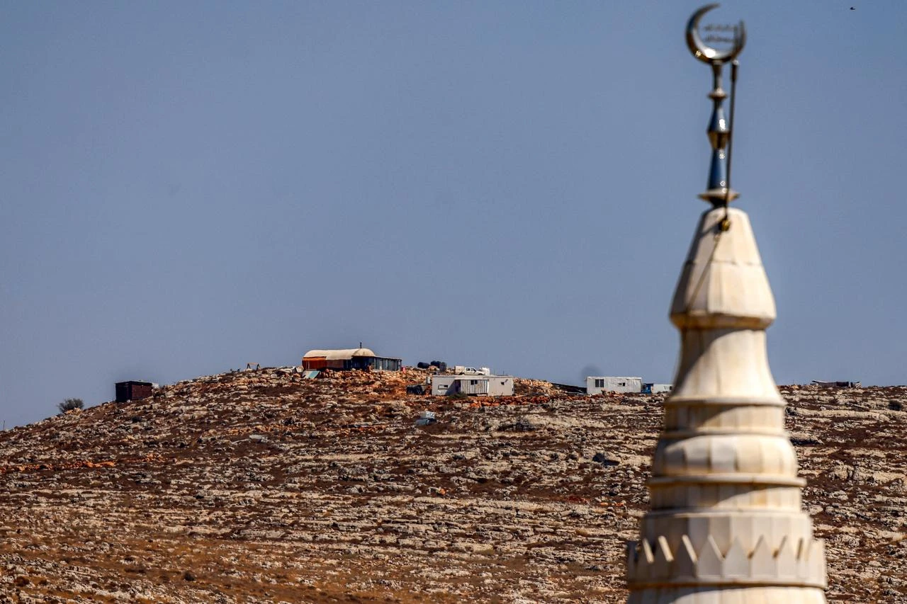 An Israeli settlement outpost is pictured atop a hill near the village of Rujaib, southeast of Nablus in the occupied West Bank, July 29, 2026. (AFP Photo)