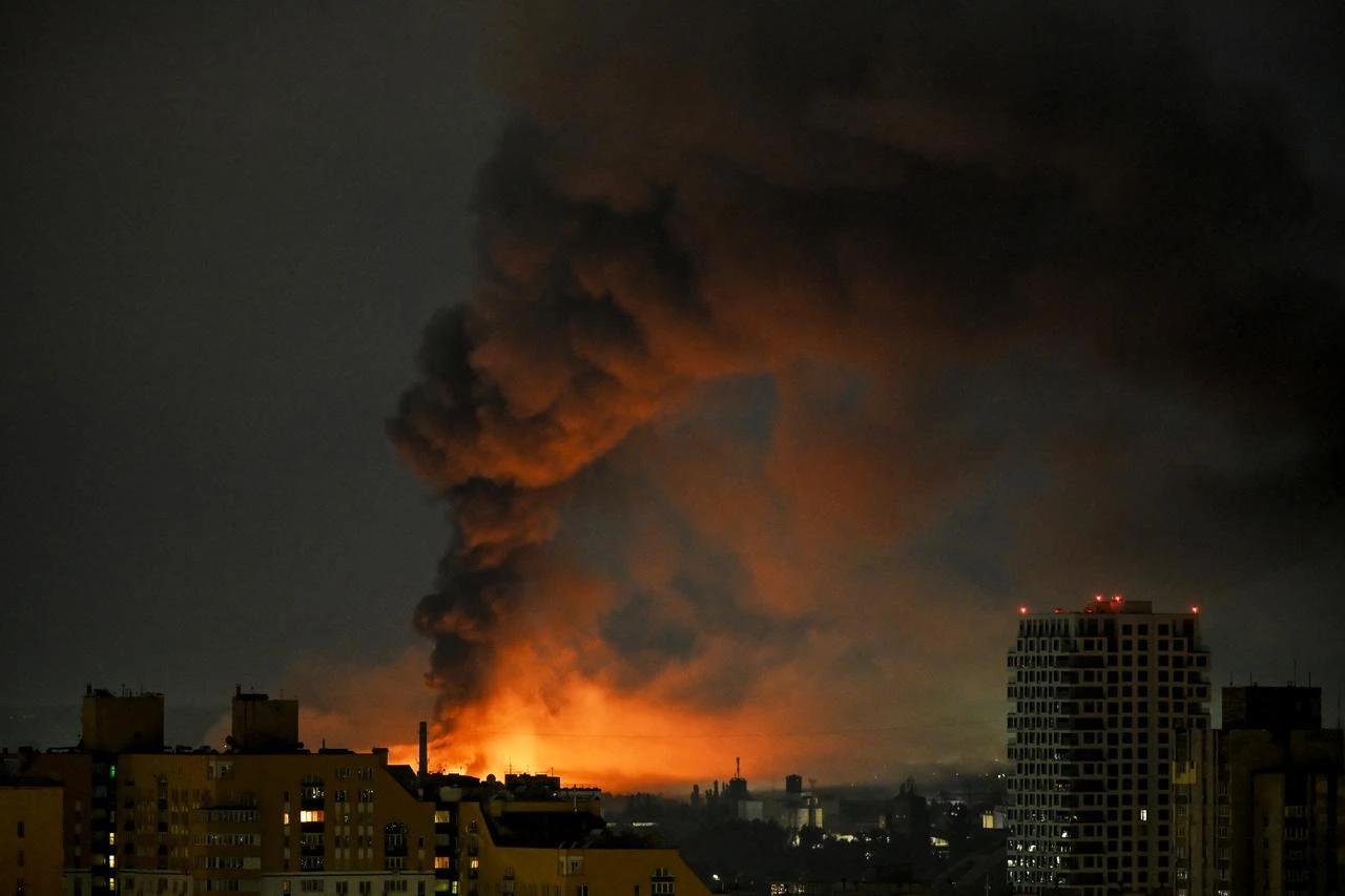 Strikes kill at least 14 as Russia and Ukraine trade blows across vast distances