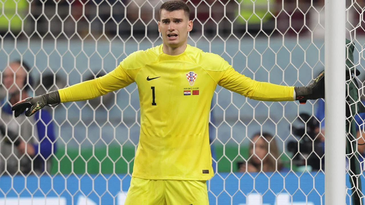 Croatia goalkeeper Dominik Livakovic gestures in goal during a senior international match against Morocco. (AFP Photo)