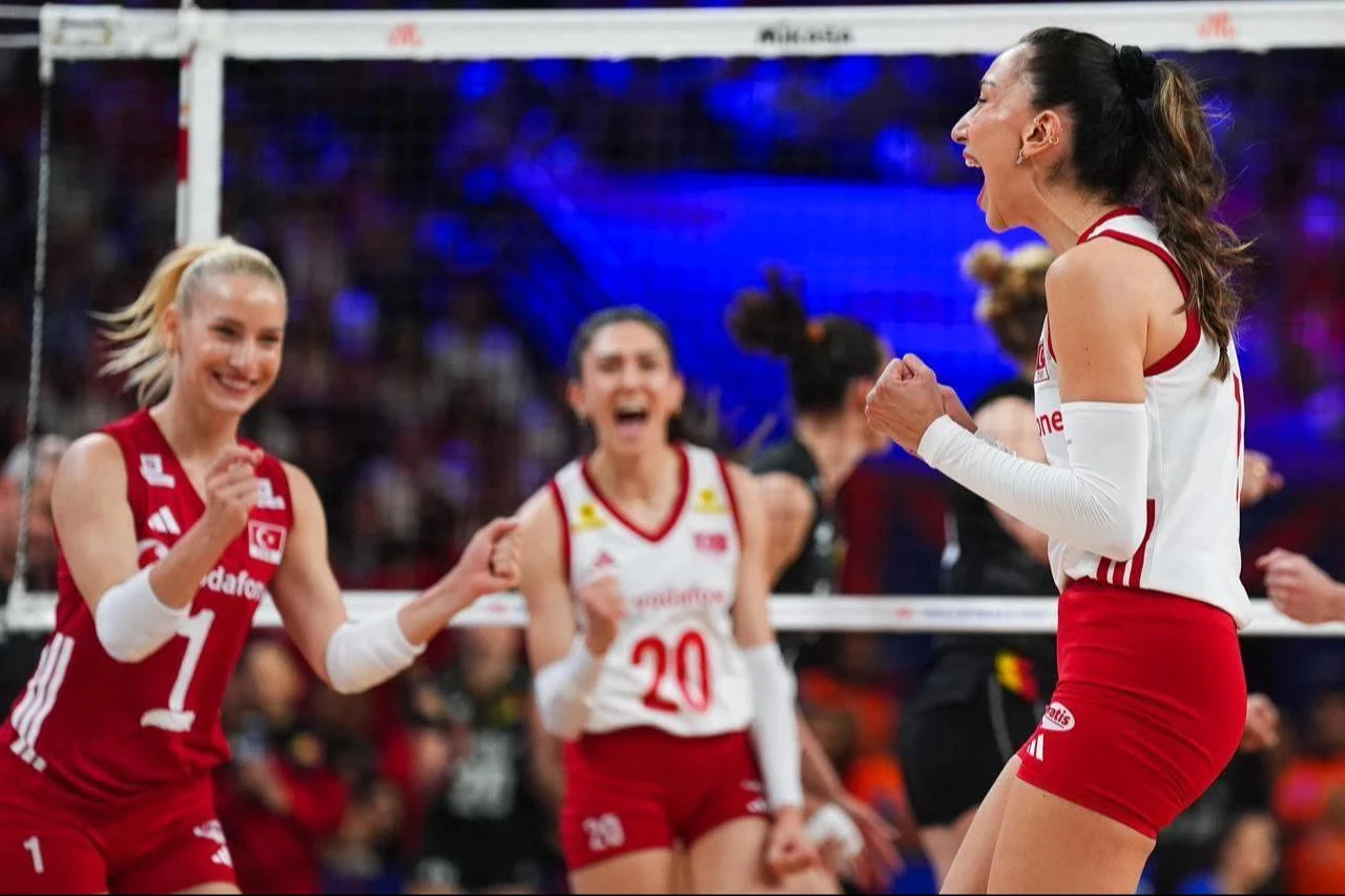 Türkiye’s Hande Baladin and Gizem Orge celebrate after scoring a point during the 2026 FIVB Volleyball Nations League match against Belgium at Ankara Sports Hall in Ankara, Türkiye, June 17, 2026. (AA Photo)