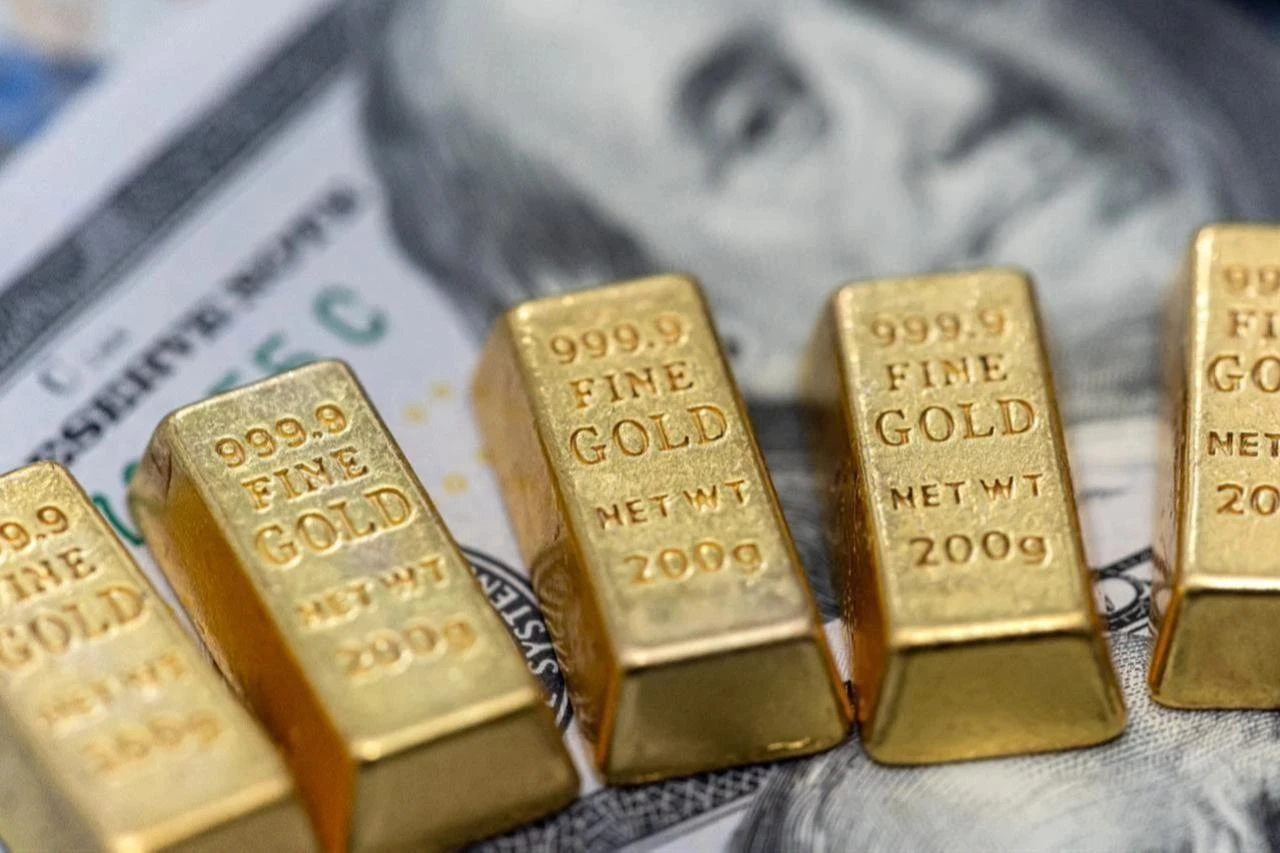 Gold slides from June highs as bitcoin posts biggest jump since February