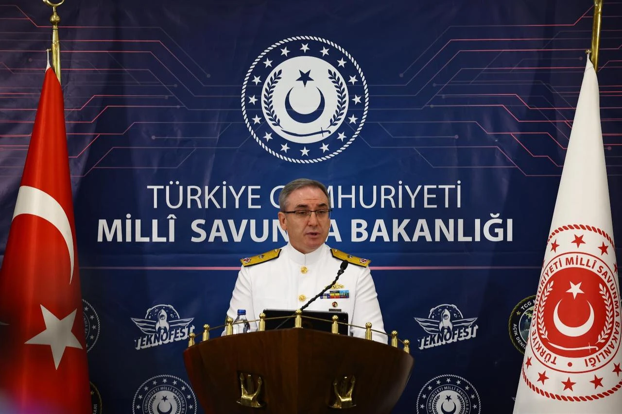 Rear Adm. Zeki Akturk, the Defense Ministry's press and public relations adviser and spokesman, speaks at a weekly press briefing held aboard the TCG Kochisar in Kocaeli, Türkiye, Aug. 20, 2026. (AA Photo)
