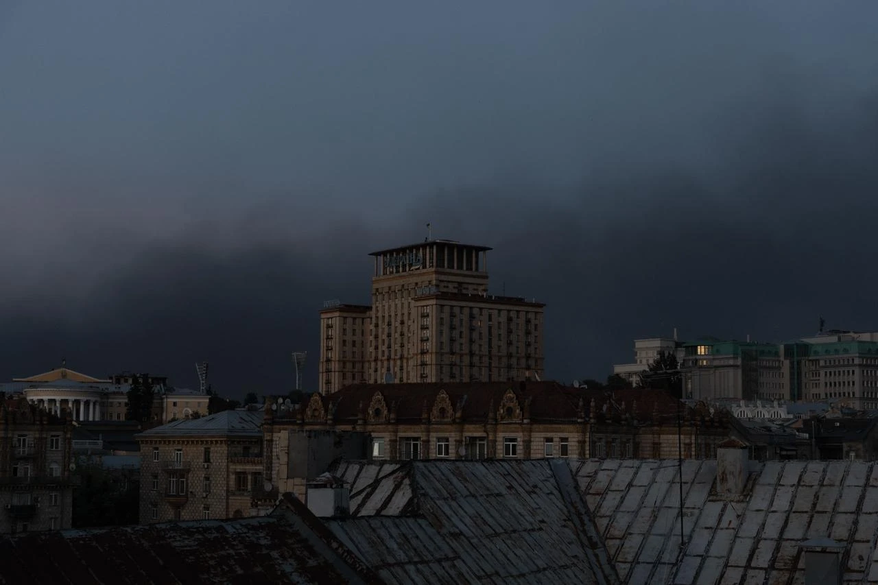 This photograph shows smoke rising over the buildings following a Russian air attack, in downtown Kyiv on August 20, 2026, amid the Russian invasion of Ukraine. (AFP Photo)