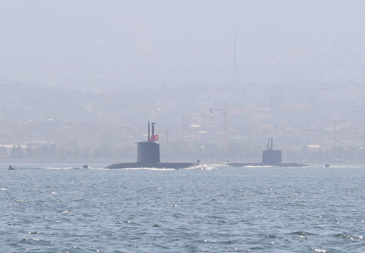 Turkish Naval Forces submarines sail through the Gulf of Izmit off the coast of Izmit district in Kocaeli, Türkiye, on August 19, 2026. (AA Photo)