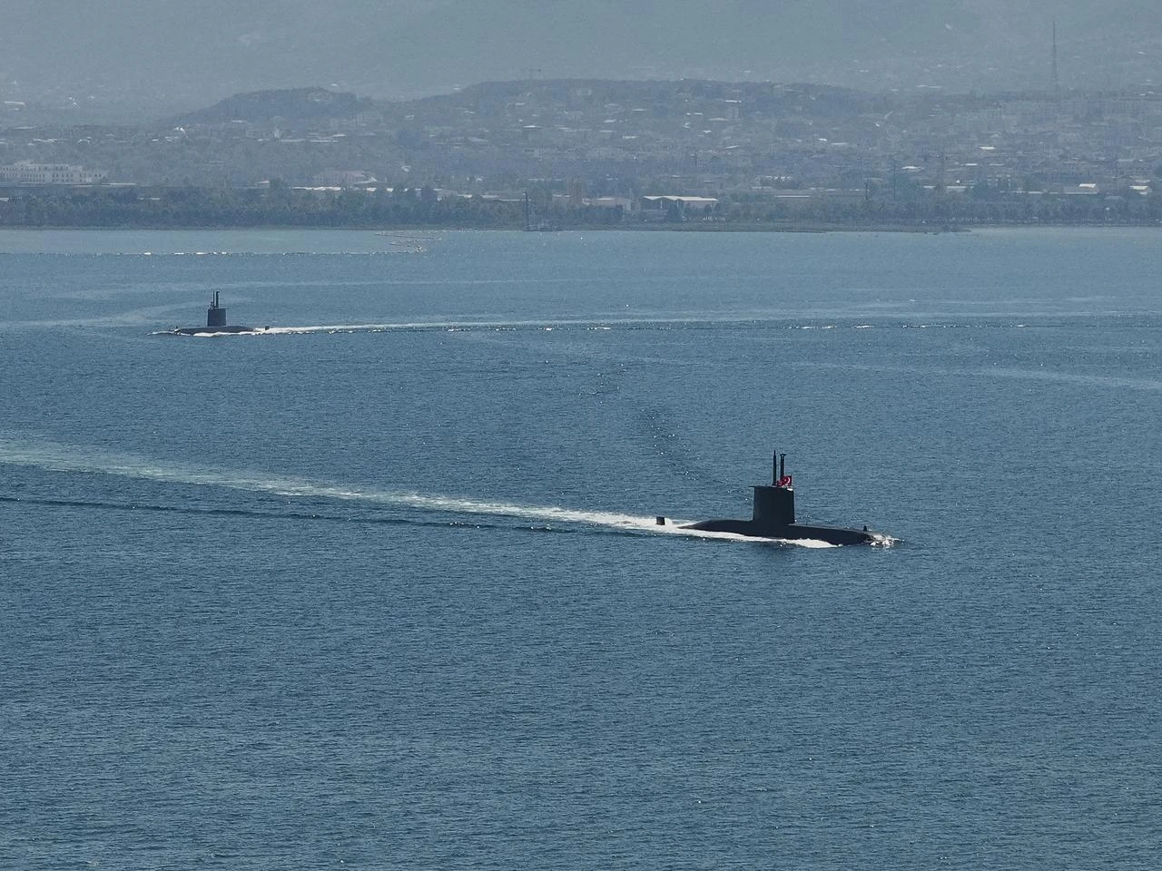 Turkish Naval Forces submarines sail through the Gulf of Izmit off the coast of Izmit district in Kocaeli, Türkiye, on August 19, 2026. (AA Photo)