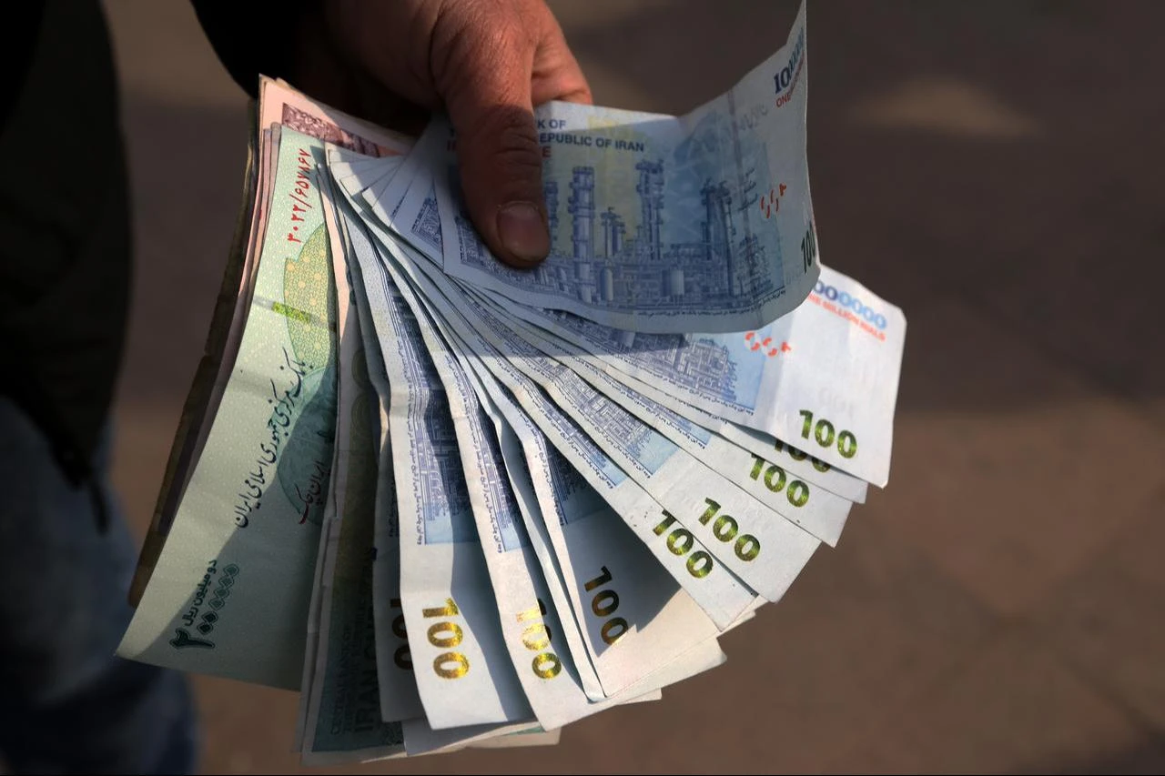 A view of the U.S dollars and Iranian rials in Tehran, Iran on December 31, 2025. (AA Photo)