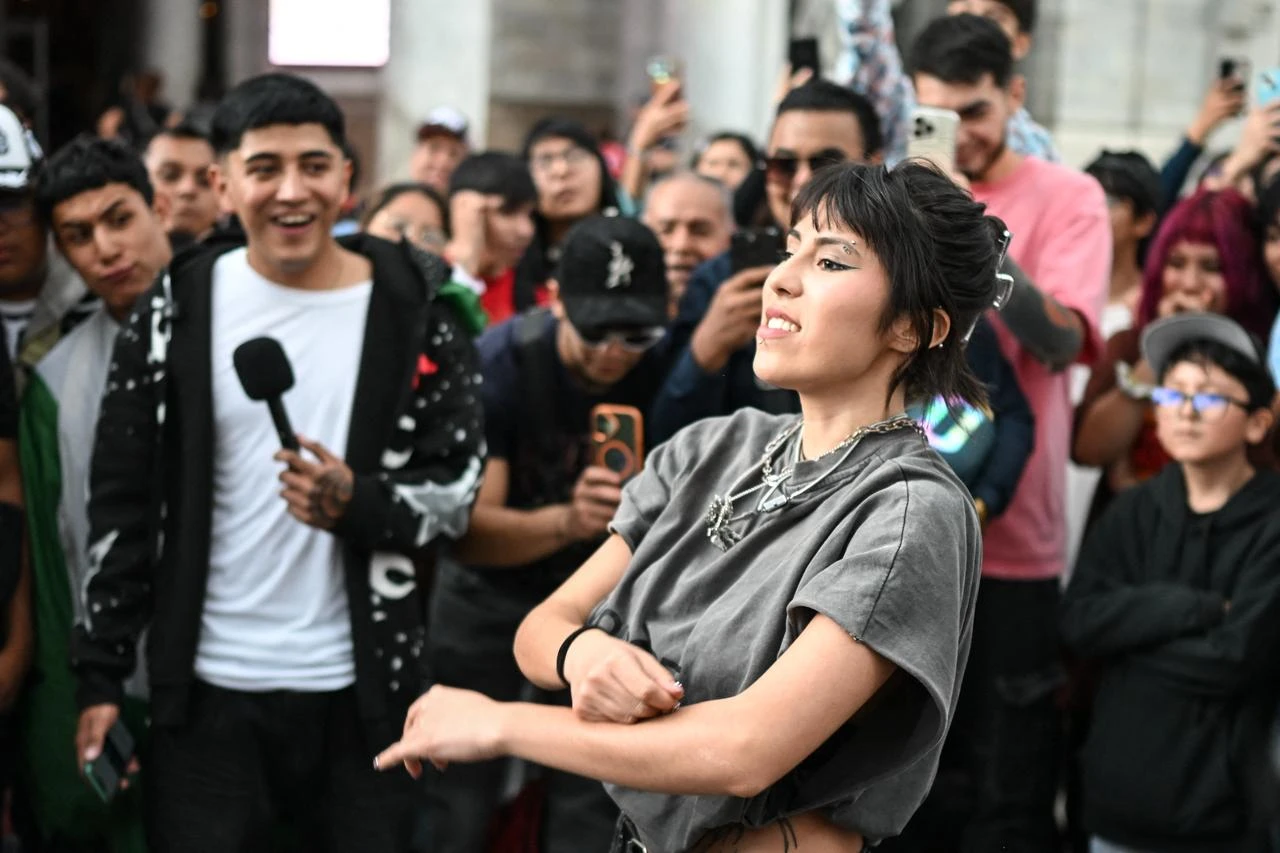 A young woman gestures to her opponent during a face-off in the so-called "Aura Battle" in Mexico City on August 20, 2026. (AFP Photo)