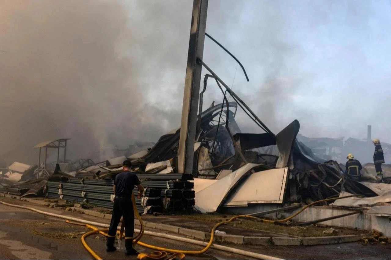 Ukrainian firefighters work to put out a fire following massive Russian ballistic missile and drone strikes in Kyiv on August 5, 2026, amid the Russian invasion of Ukraine. (AFP Photo)