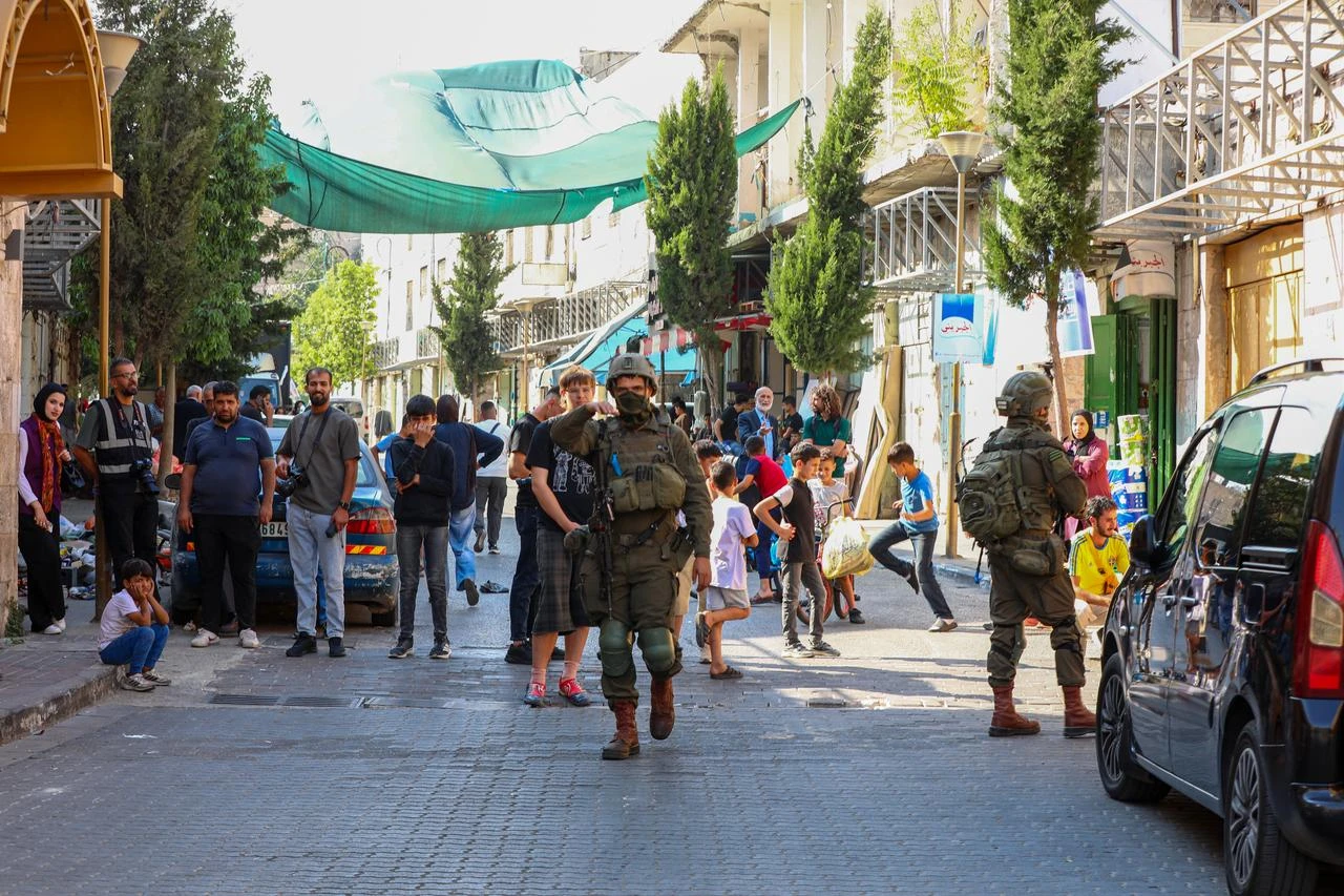 Israelis raid the Old City area of the city of Hebron, West Bank, Palestine under the protection of Israeli forces on August 22, 2026. (AA Photo)
