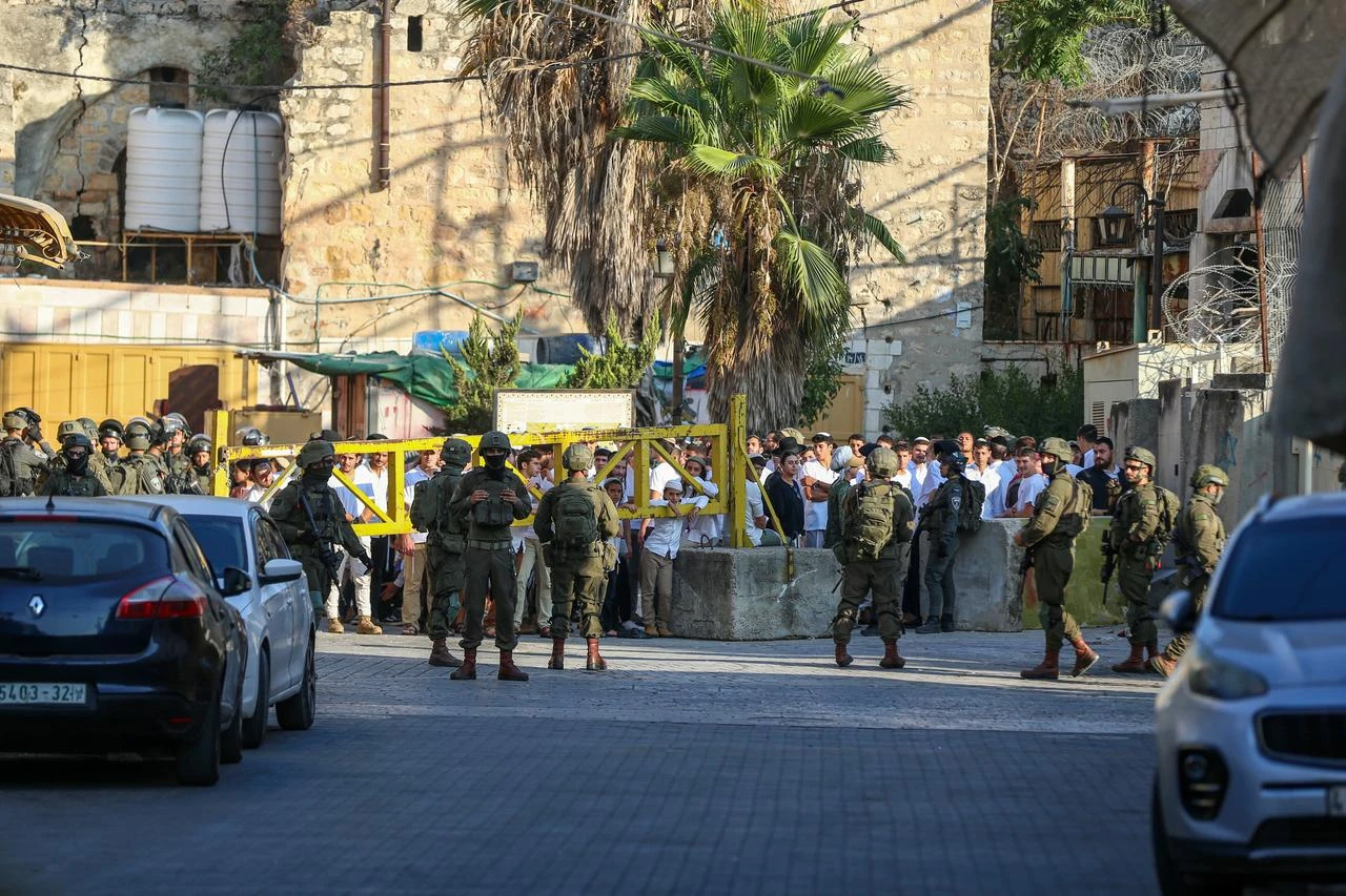 Israelis raid the Old City area of the city of Hebron, West Bank, Palestine under the protection of Israeli forces on August 22, 2026. (AA Photo)