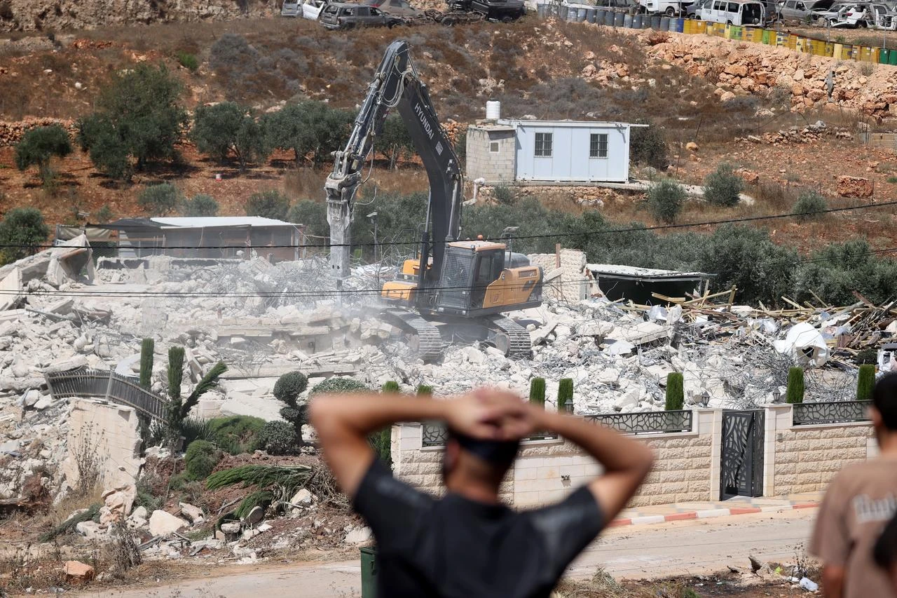 A view of the damage and rubble after Israeli forces demolished a two-story Palestinian-owned residential building in Qalandiya town, northwest of East Jerusalem, on August 17, 2026. (AA Photo)