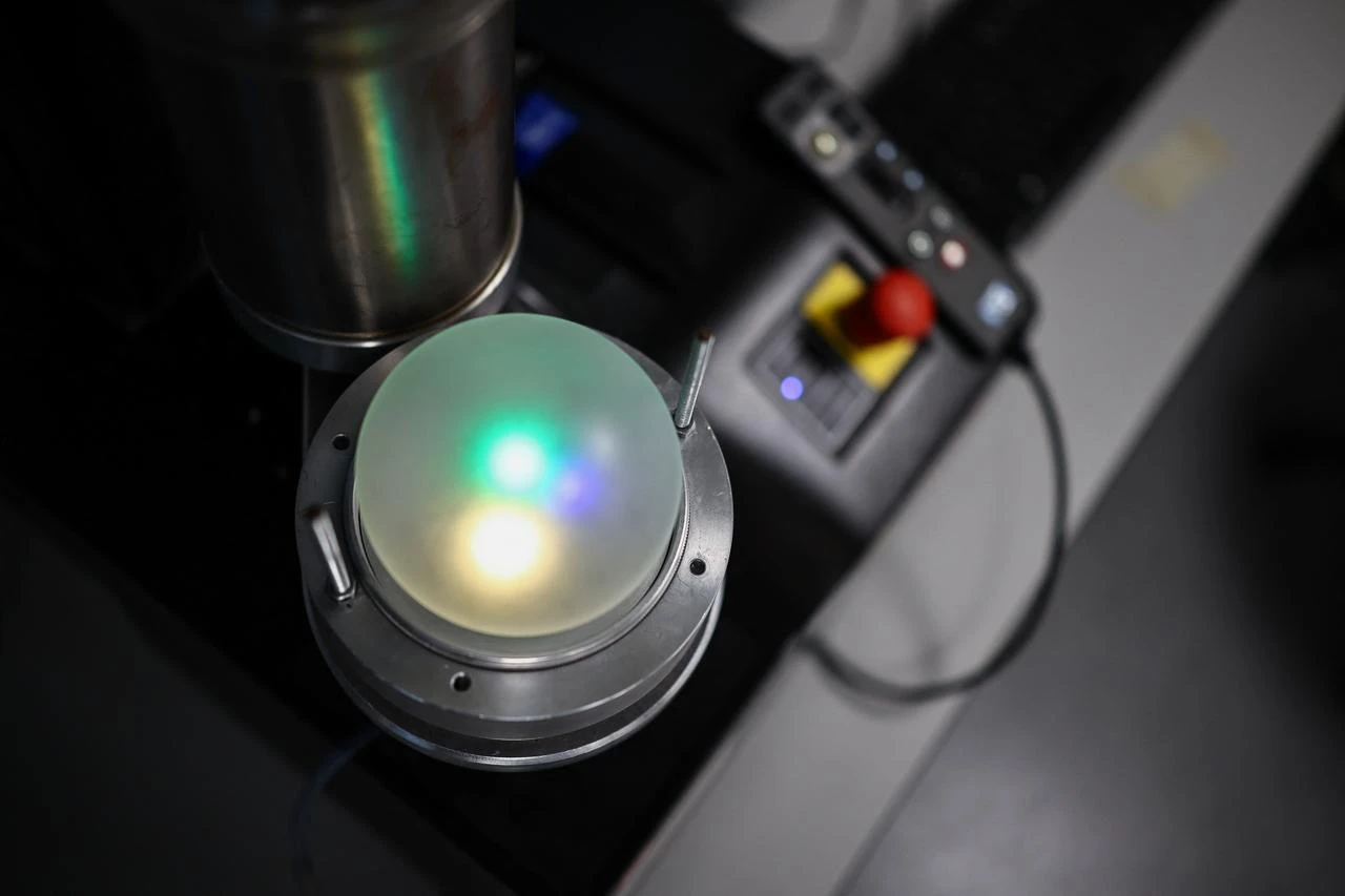 A biodegradable Bioloon prototype is pictured in testing equipment at Imperial College London in London, Britain, Aug. 22, 2026. (AFP Photo)