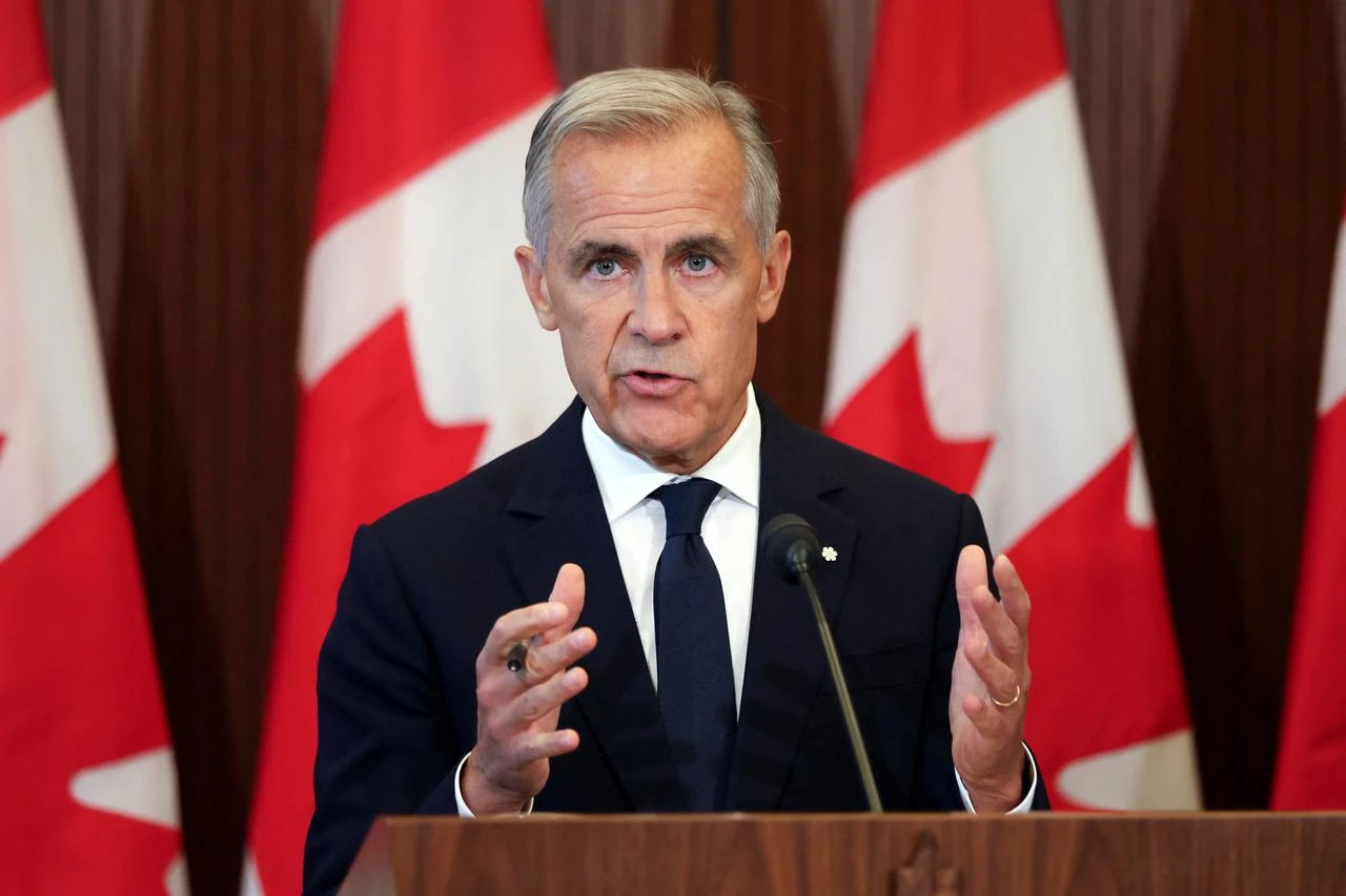 Canadian Prime Minister Mark Carney speaks at a press conference in Ottawa, Ontario, on August 22, 2026 after trade talks with the US collapsed. (AFP Photo)