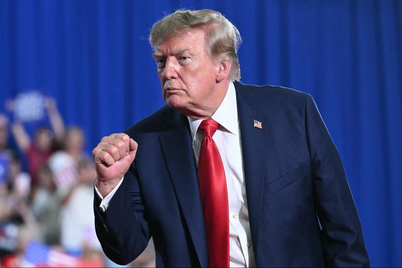 US President Donald Trump clenches his fist after speaking at a campaign rally for US Senator Darline Graham at Myrtle Beach Convention Center in Myrtle Beach, South Carolina on August 21, 2026. (AFP Photo)
