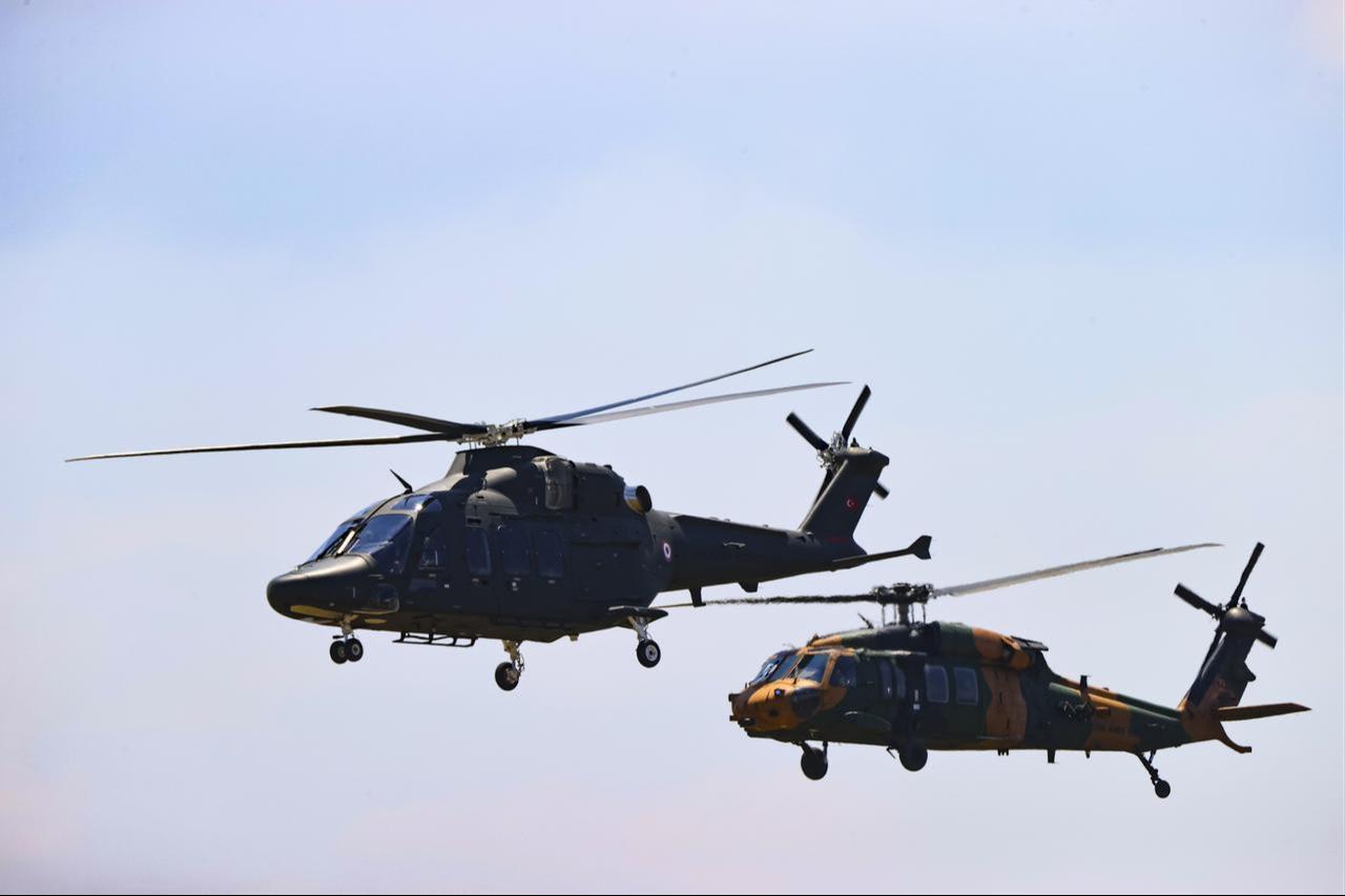 T625 Gokbey multirole helicopter personnel take part in the daytime activities as part of the Distinguished Observer Day of the EFES-2026 Exercise in Izmir, Türkiye, May 21, 2026. (AA Photo)