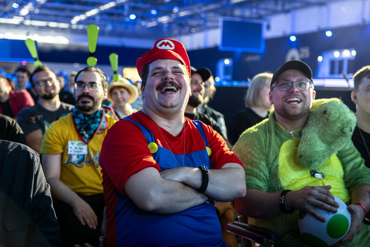 Attendees dressed as video game characters watch an event during Gamescom 2025 in Cologne, Germany, August 2025. (Photo via Gamescom)