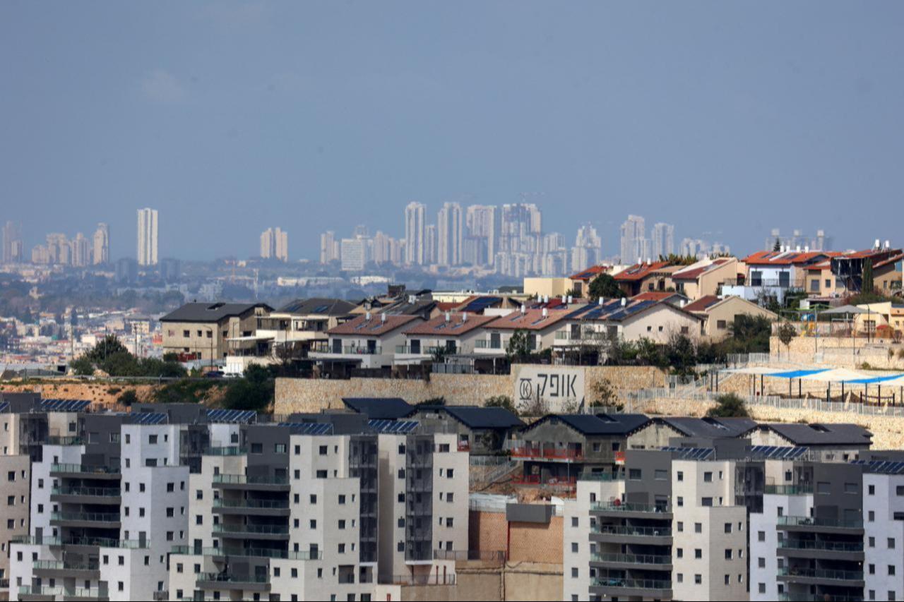 A view of the Israeli settlement of Tzufim in the north of Qalqilya city in occupied West Bank is pictured against the backdrop of Israeli city of Netanya, February 25, 2026. (AFP Photo)
