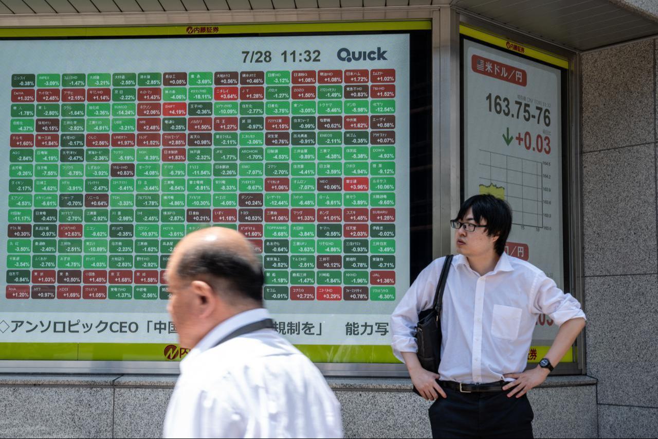 An electronic quotation board displays the Nikkei Stock Average on the Tokyo Stock Exchange in Tokyo, July 28, 2026. (AFP Photo)