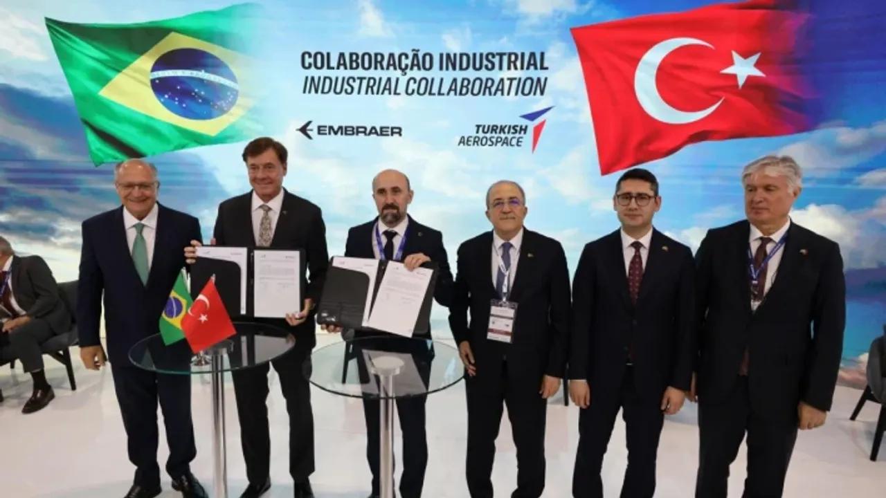 Representatives of Turkish Aerospace Industries and Brazil's Embraer sign a memorandum of understanding (MoU) at a defense expo, Brazil, on April 1, 2025. (Photo via AA)