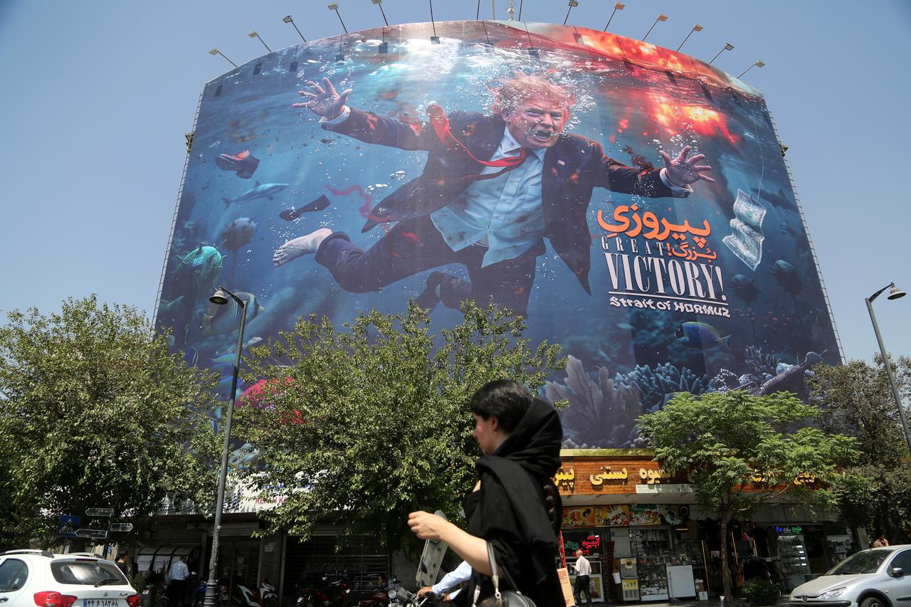 A large billboard bearing the slogan "Great Victory" in both Persian and English is seen displayed at Rah Ahen Square in Tehran, Iran, on August 25, 2026. (AA Photo)