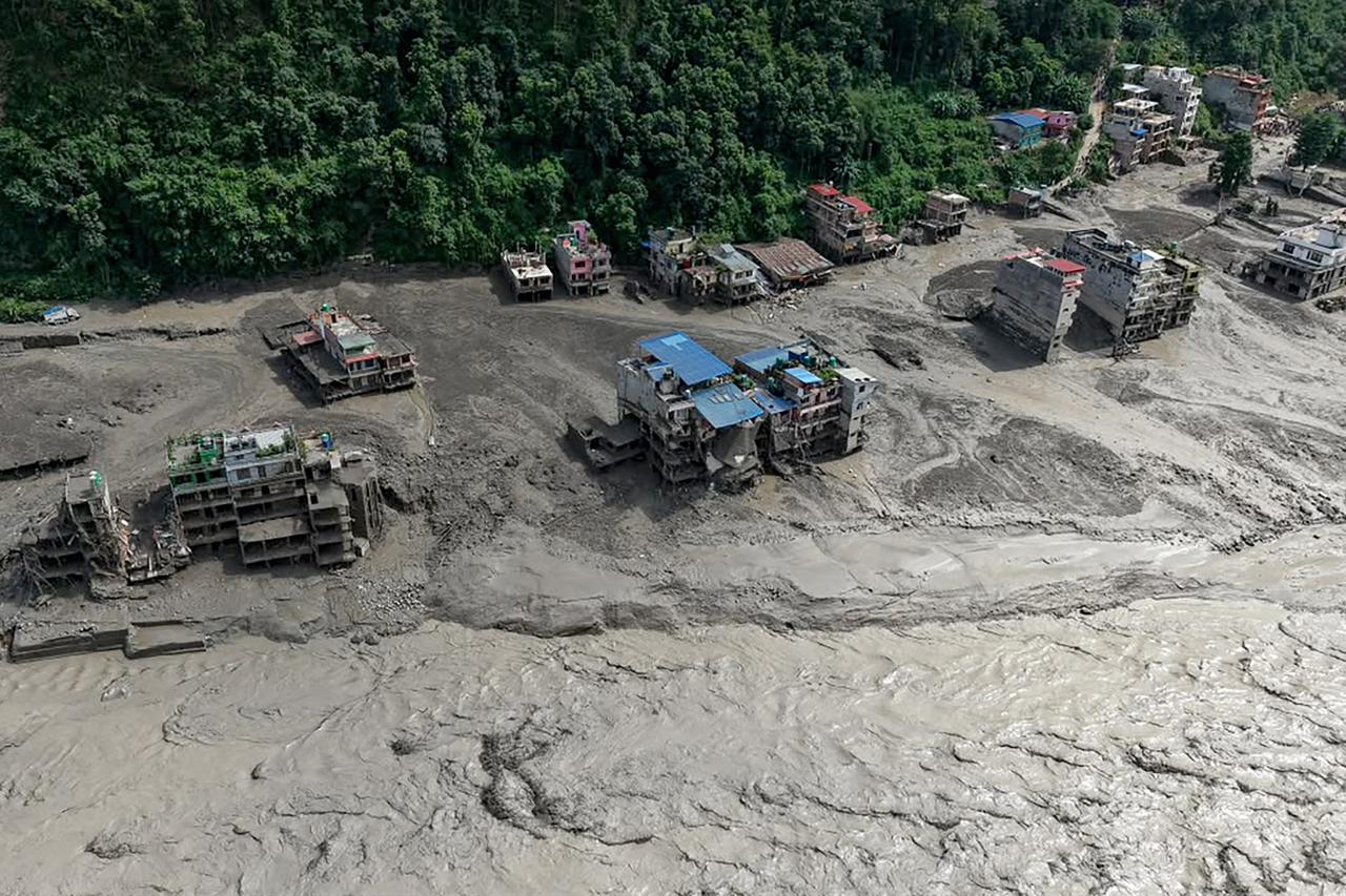 Nepal-Tibet border flood kills 18, hundreds missing