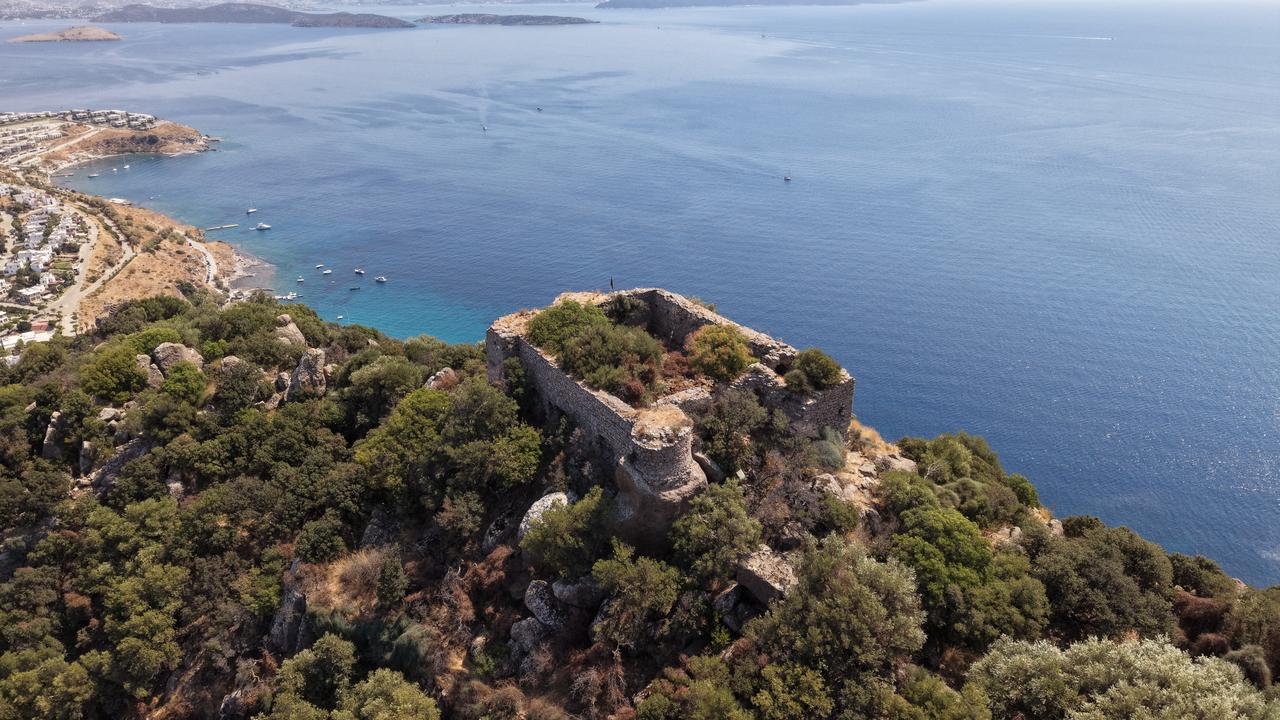 An aerial view shows the ruins of Aspat Castle overlooking the Aegean Sea in Bodrum, Mugla, Türkiye, Aug. 27, 2026. (AA Photo)