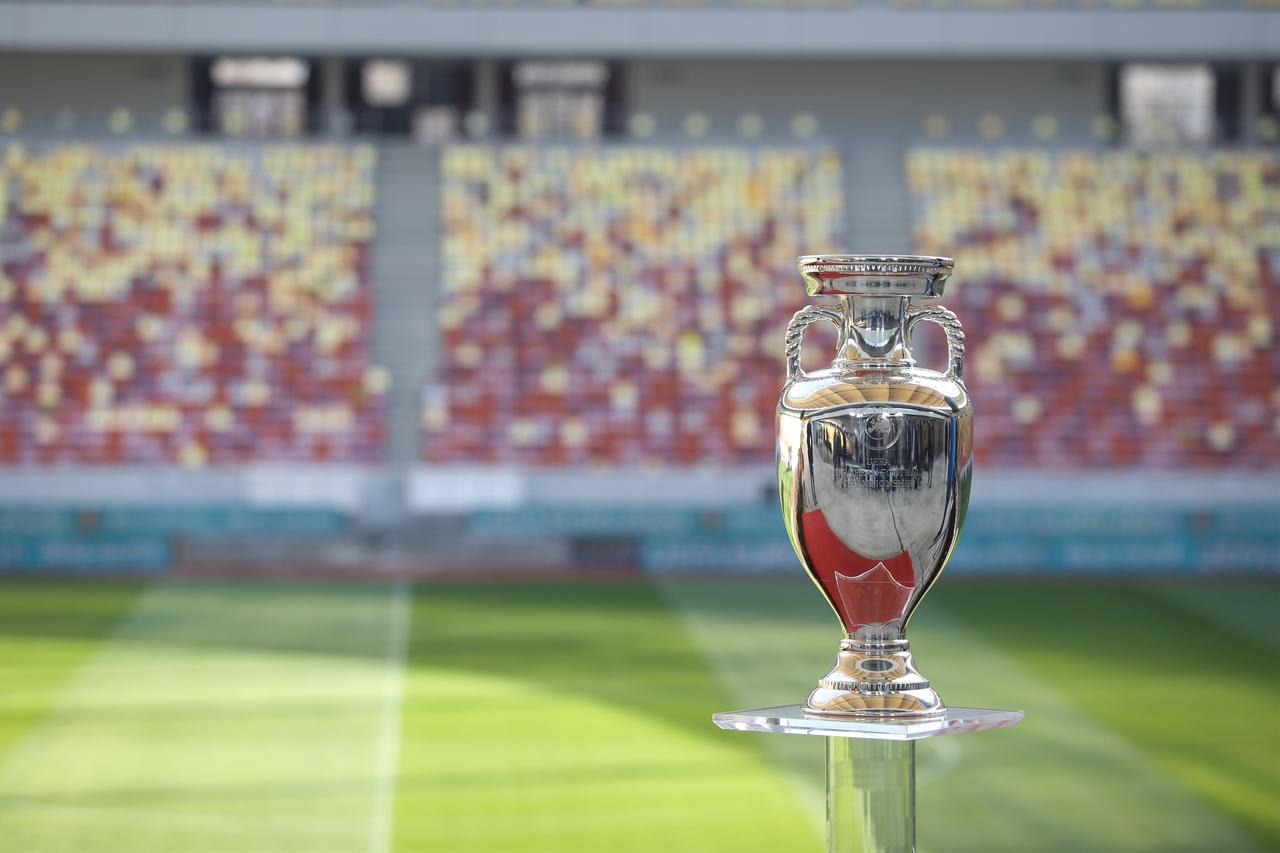 UEFA European Championship trophy is displayed inside a football stadium. (Adobe Stock Photo)