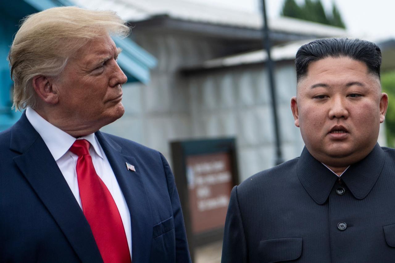 US President Donald Trump and North Koreas leader Kim Jong-un talk before a meeting in the Demilitarized Zone (DMZ) in Panmunjom, Korea, on June 30, 2019. (AFP Photo)