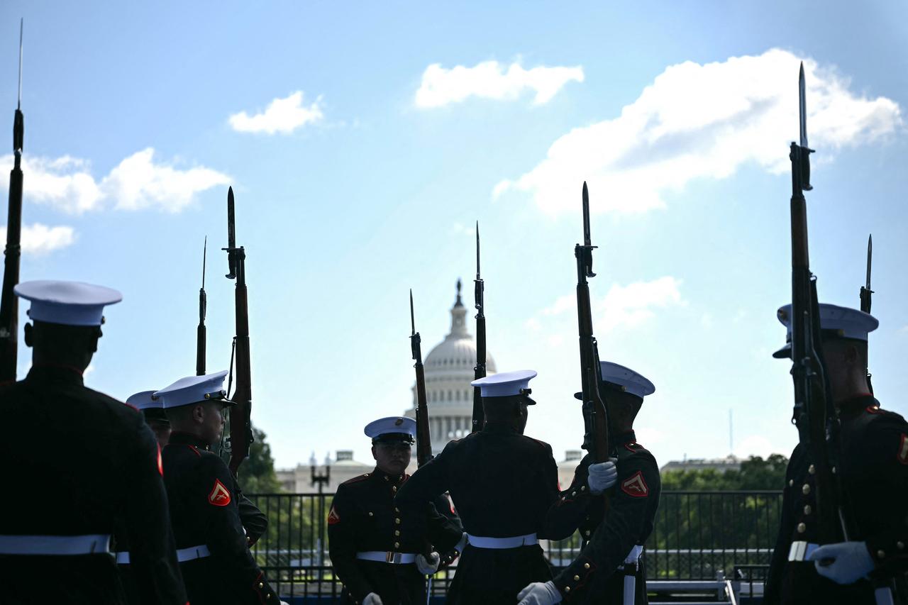 Members of a US Marines silent drill team gather before the start of the IndyCar Freedom 250 Grand Prix in Washington, DC, on August 23, 2026. (AFP Photo)
