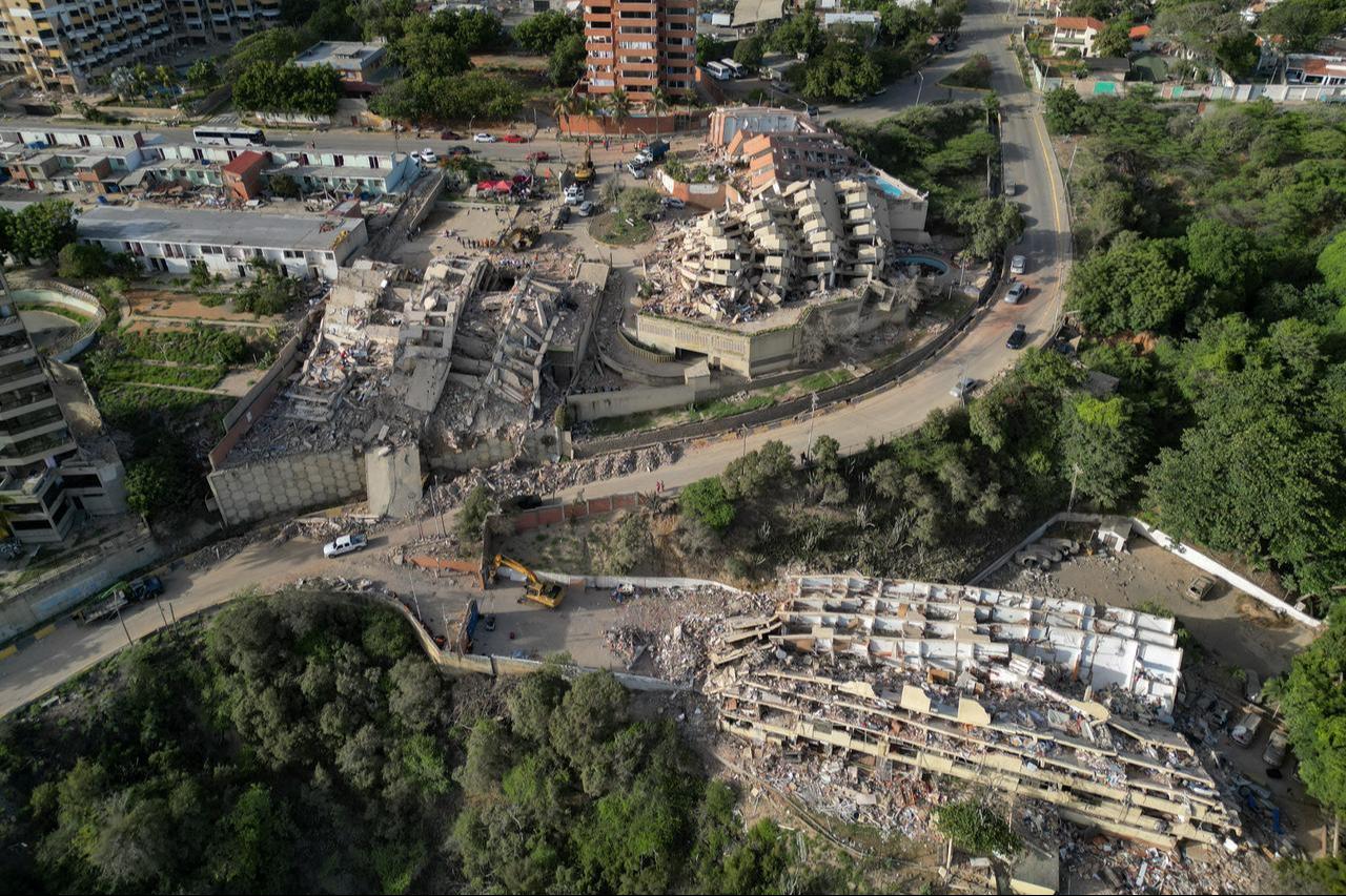 This aerial view shows collapsed buildings in Catia La Mar, La Guaira state, Venezuela, on June 27, 2026, following earthquakes that struck the region. (AFP Photo)