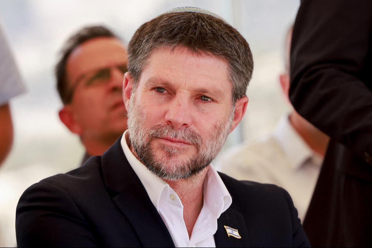 Israeli far-right Finance Minister Bezalel Smotrich sits before a press conference near the settlement of Maale Adumim, in a land corridor known as E1, outside Jerusalem in the occupied West Bank, August 14, 2025. (AFP Photo)