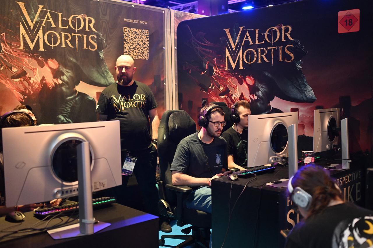 Gamers play the "Valor Mortis" video game at the Indie game area during the Gamescom video games trade fair on the fair grounds in Cologne, western Germany, on August 27, 2026. (AFP Photo)