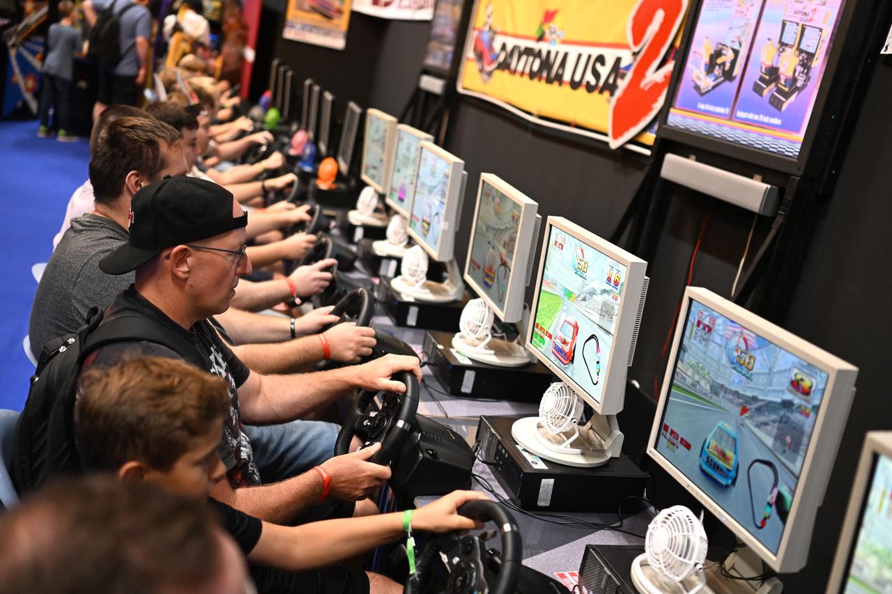 Gamers play retro video games at the Gamescom video games trade fair on the fair grounds in Cologne, western Germany, on August 27, 2026. (AFP Photo)