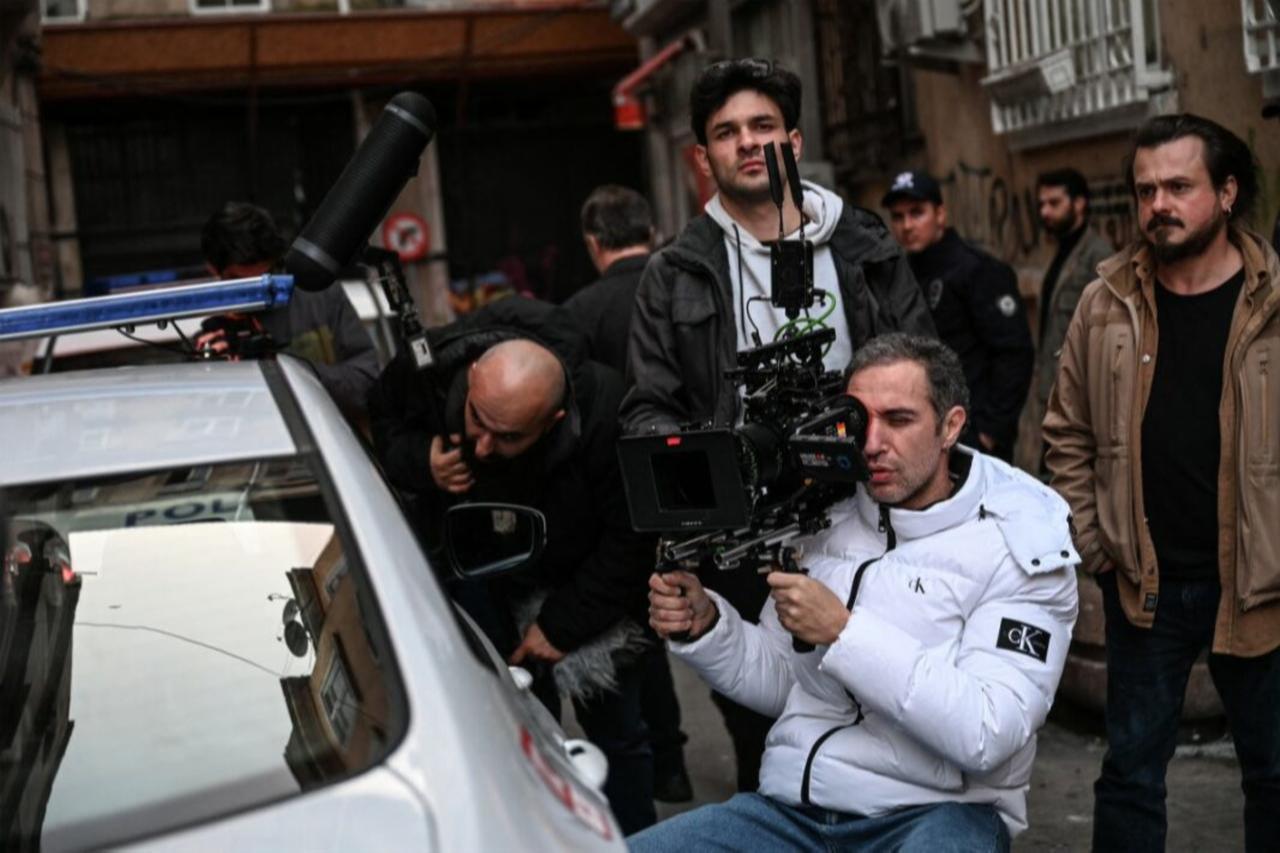 Set workers prepare for a scene of the 'Dengeler', a Turkish TV series on the set at Tophane district in Istanbul, Türkiye, on February 28, 2024. (AFP Photo)