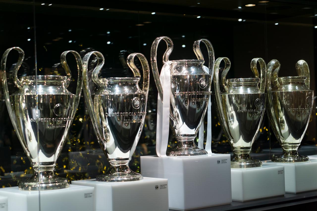 UEFA Champions League trophies are displayed together in a football museum collection. (Adobe Stock Photo)