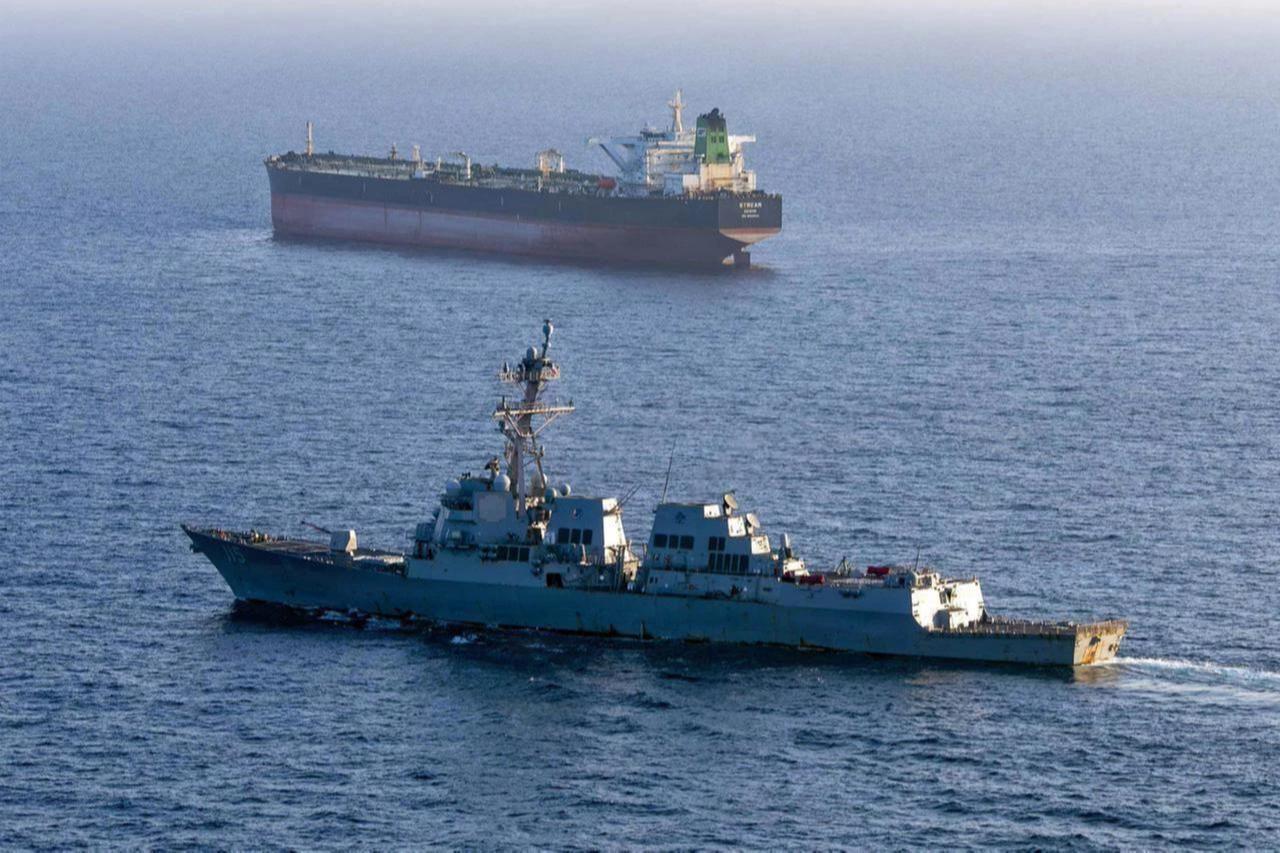 Photo shows the Arleigh Burke-class guided-missile destroyer USS Rafael Peralta (DDG 115) implementing a maritime blockade against the Iran-flagged crude oil tanker on April 26, 2026. (AFP Photo/US Navy/NAVCENT Public Affairs/Handout)