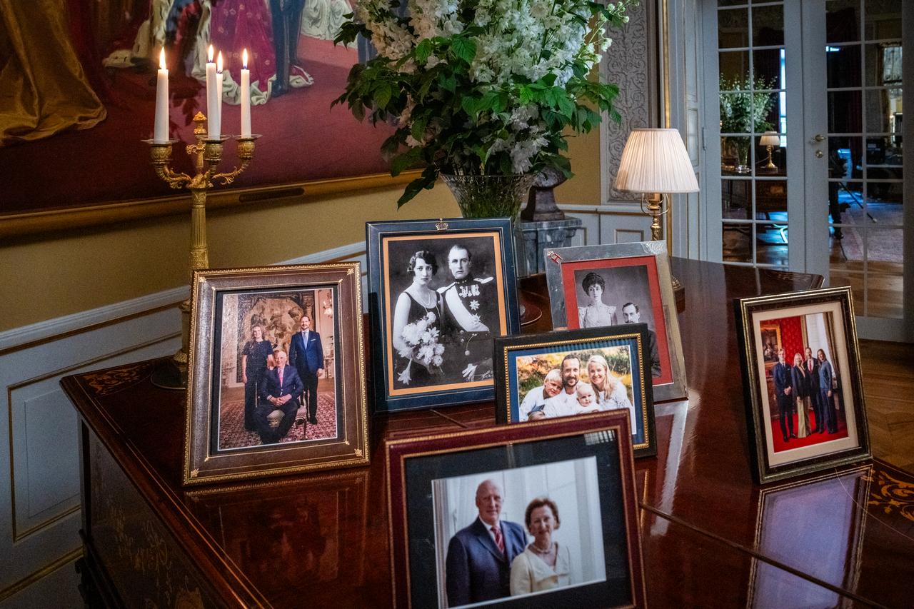 A gallery of historical photos of the royal family is placed in the Hall of Mirrors at the palace where Norway's new King Haakon VIII made his first speech to the nation at the Royal Palace in Oslo on August 29, 2026. (AFP Photo)