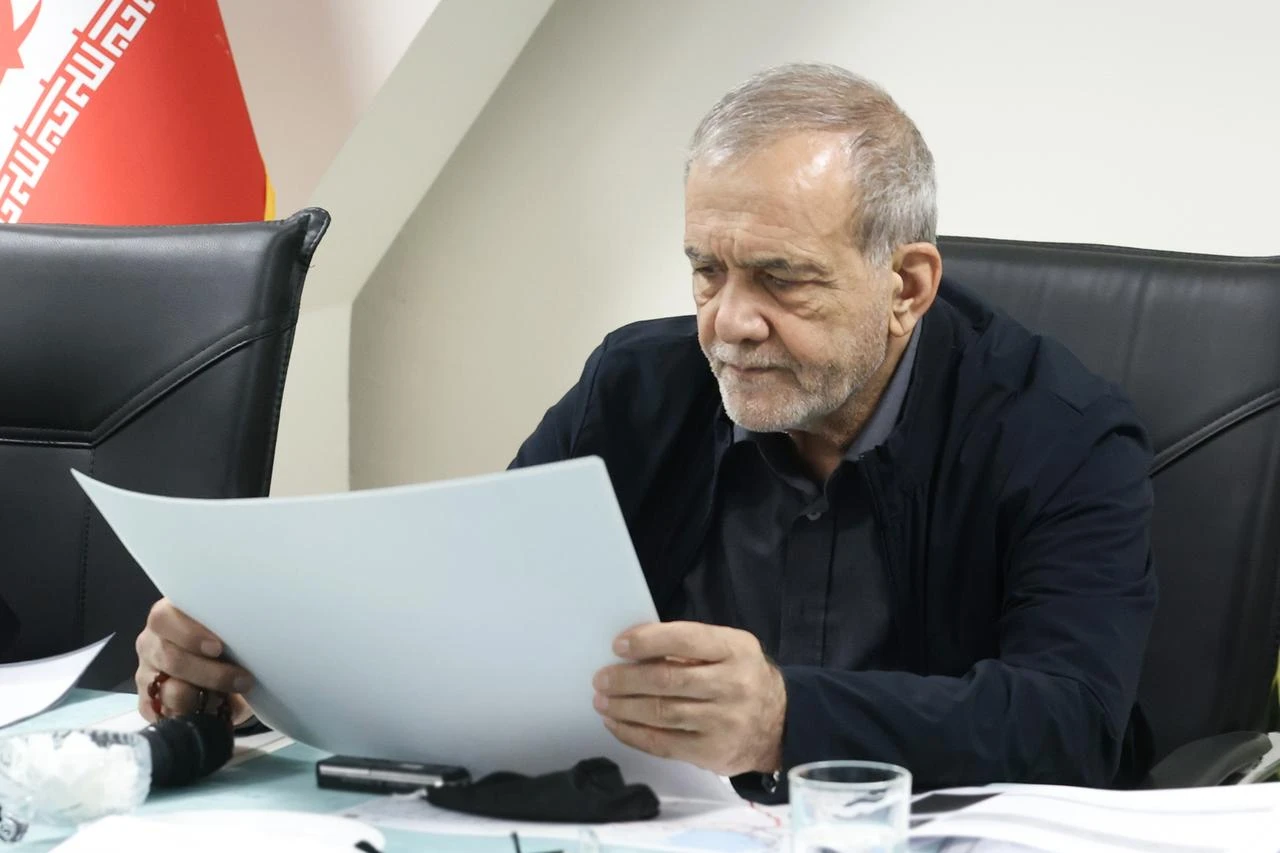 Iranian President Masoud Pezeshkian delivers remarks during a meeting with officials from the Ministry of Roads and Urban Development in Tehran, Iran on July 26, 2026.  (Iranian Presidency Handout/AA Photo)