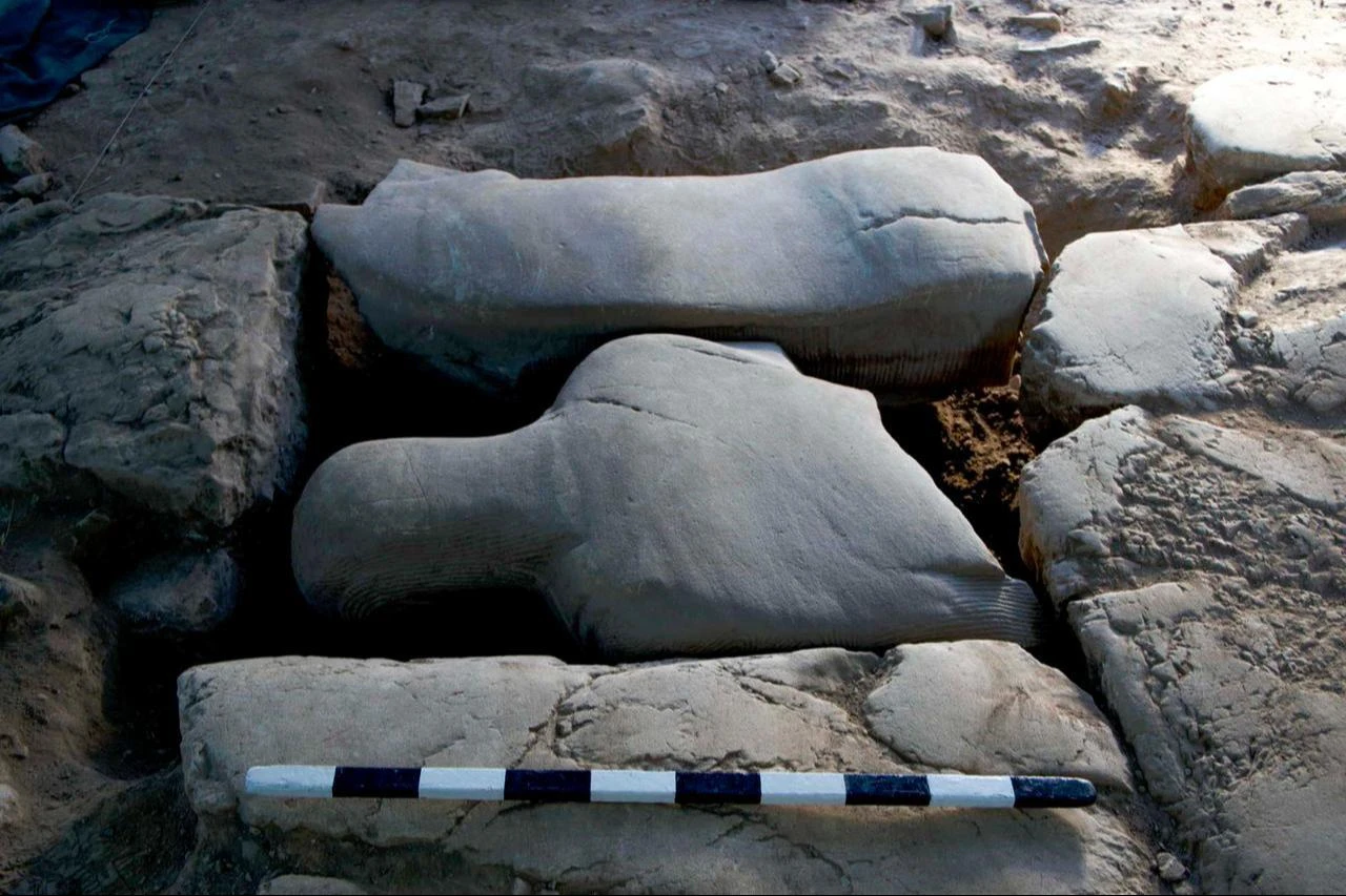 The monumental marble statue is seen embedded among paving stones at Sardis in Manisa, western Türkiye, where its face-down placement helped preserve its carved details for centuries. (AA Photo)