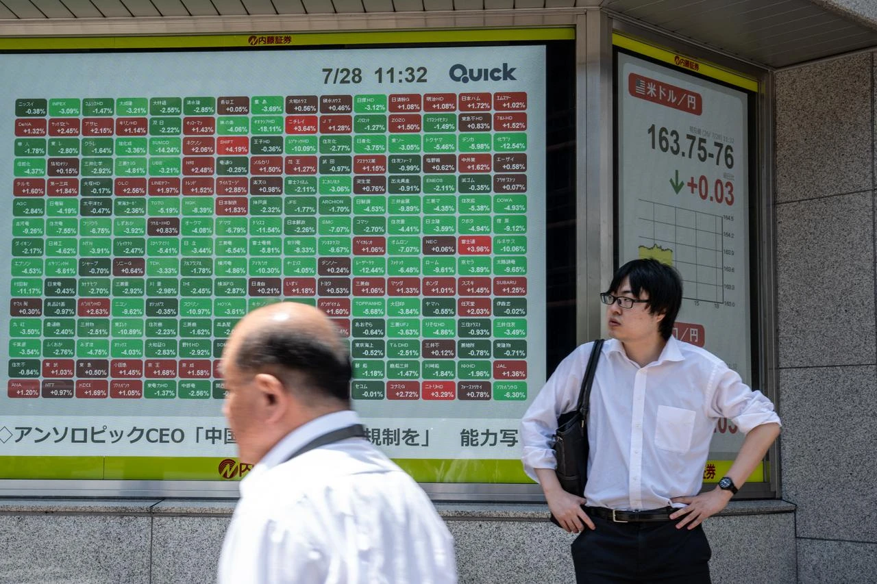 An electronic quotation board displays the Nikkei Stock Average on the Tokyo Stock Exchange in Tokyo, July 28, 2026. (AFP Photo)