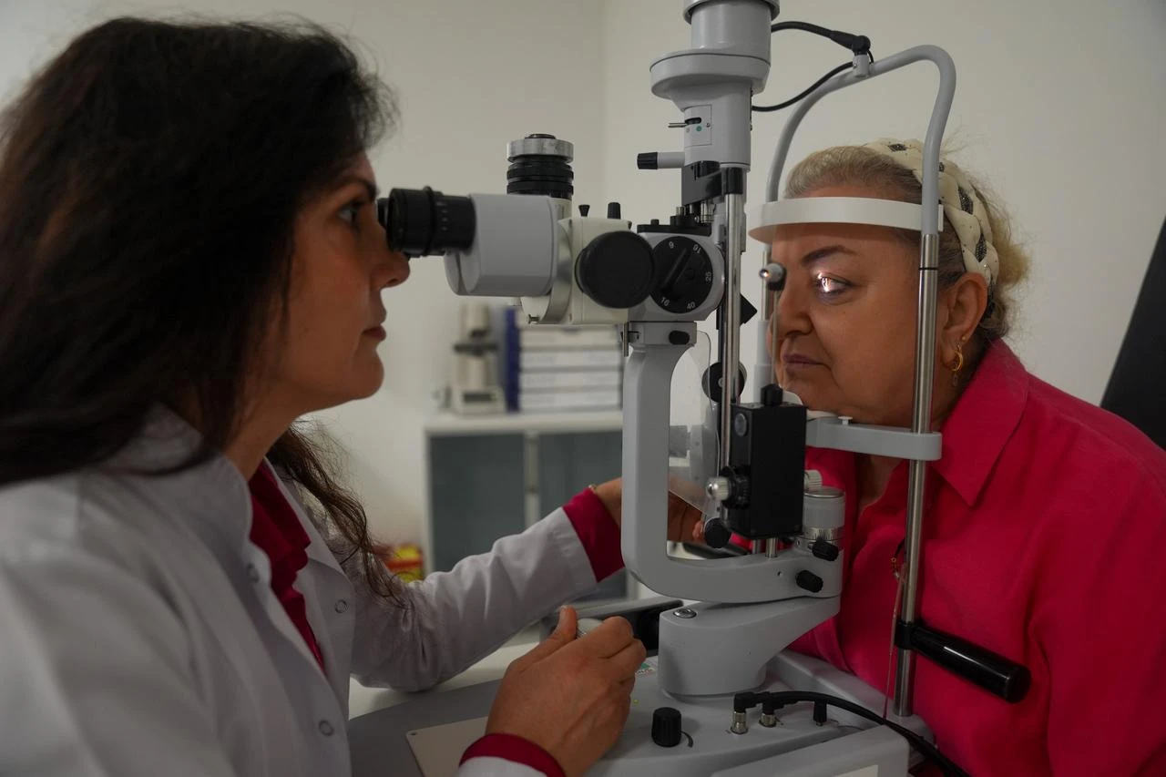 Assoc. Prof. Cigdem Coskun, an ophthalmology specialist at Bilkent City Hospital, poses inside an eye examination room in Ankara, Türkiye. (AA Photo)