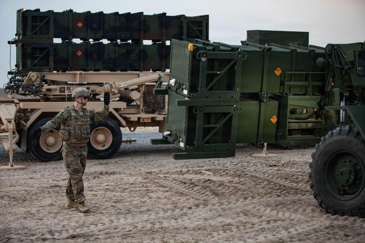 U.S. Army air defense artillerymen and logisticians conduct ammunition resupply in the Middle East for a Patriot missile system. (Photo via U.S. Army)