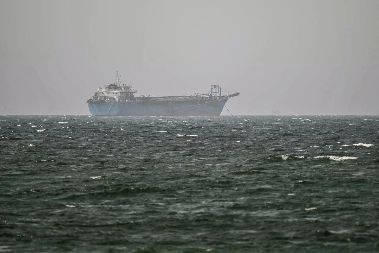 A vessel is anchored off the coast of Sharjah in the United Arab Emirates on August 3, 2026. (AFP Photo)